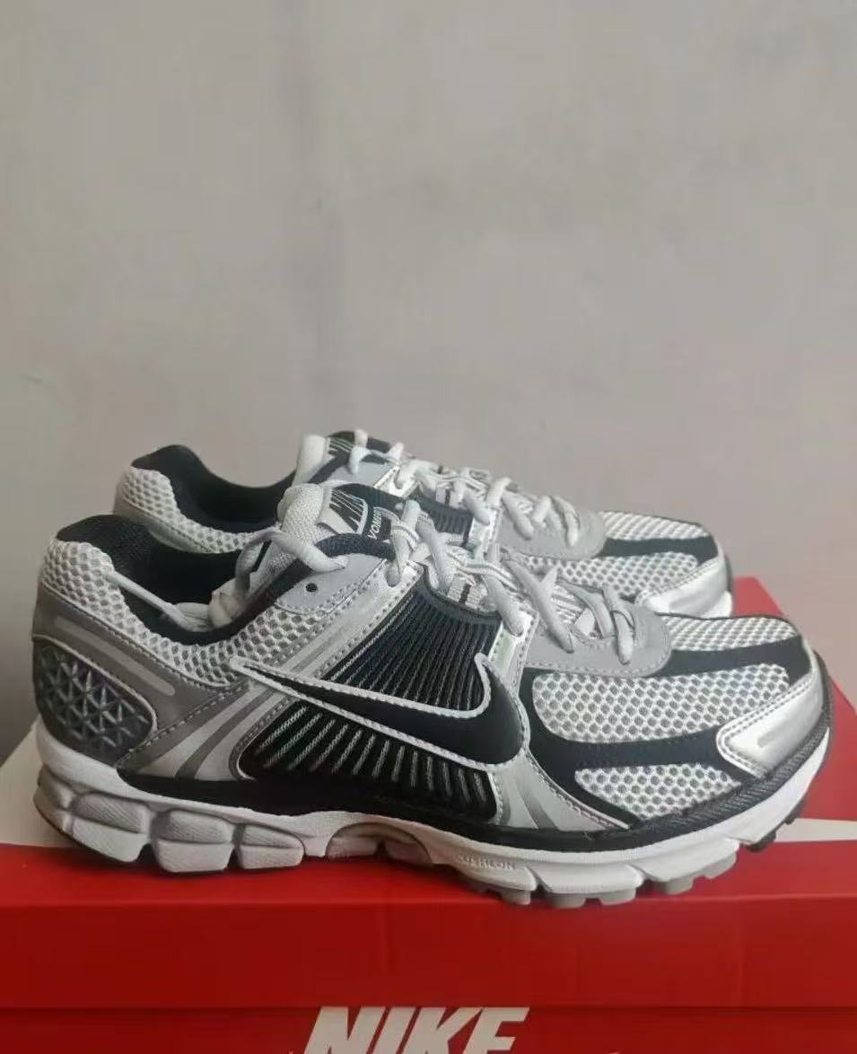 Nike Air Max 96 Sneakers in Silver Gray and Black - product image from the listing.
