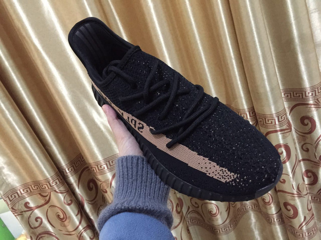 Black and Beige Yeezy 350 V2 Knit Sneakers - product image from the listing.