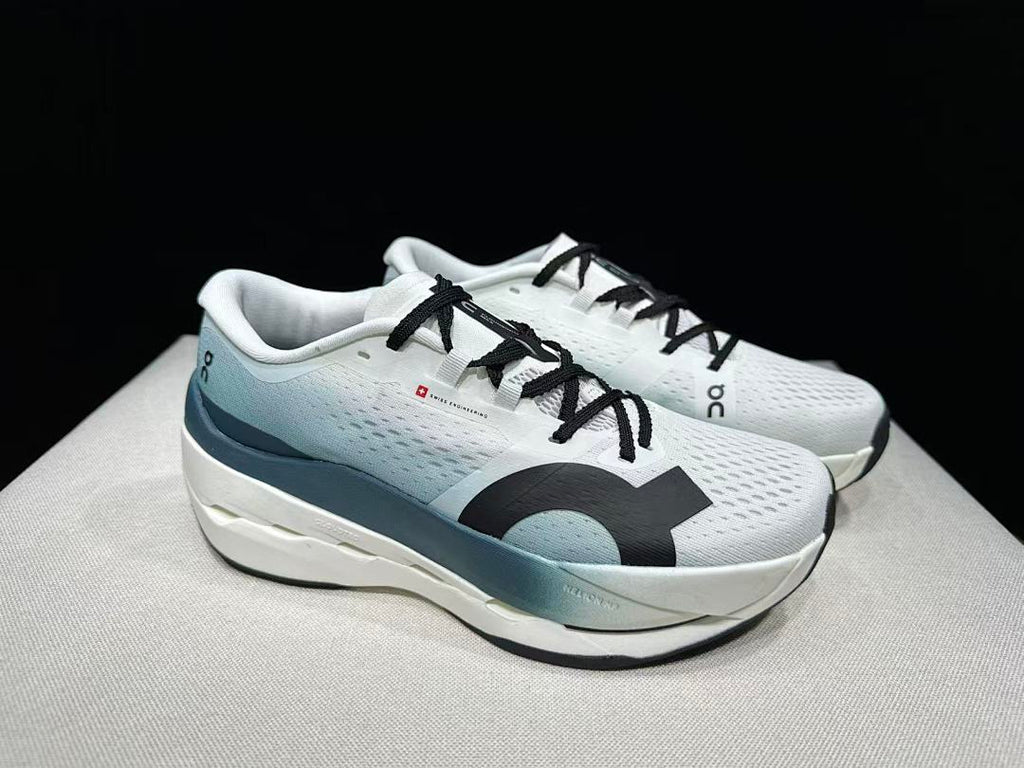 On Cloudboom Max Running Shoes in White and Lake in Blue - product image from the listing.