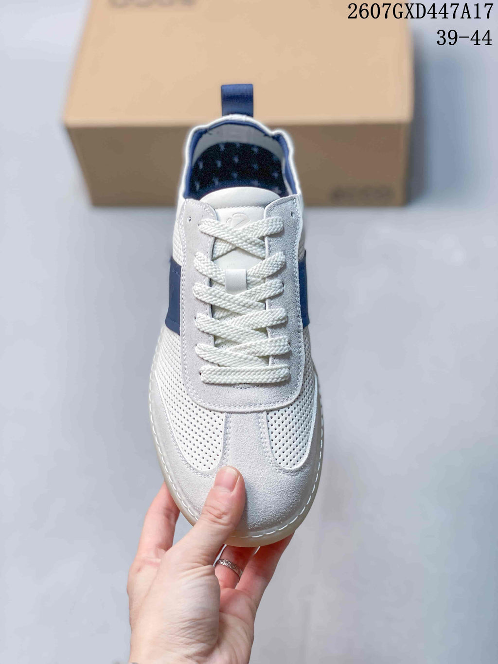 ECCO 2607GXD447A17 White and Blue Perforated Trainers - product image from the listing.