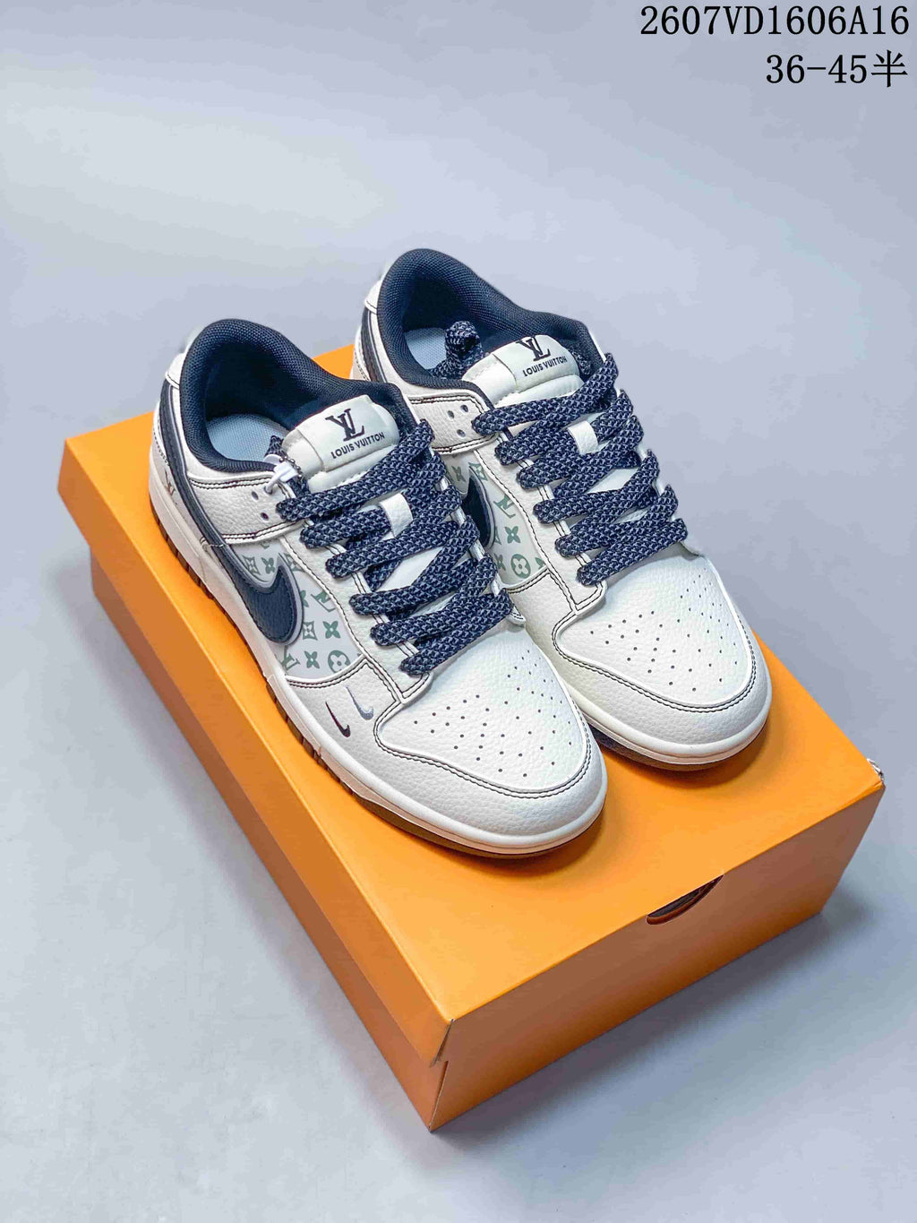 Nike SB Dunk Low LV Monogram Sneakers in White and Navy - product image from the listing.
