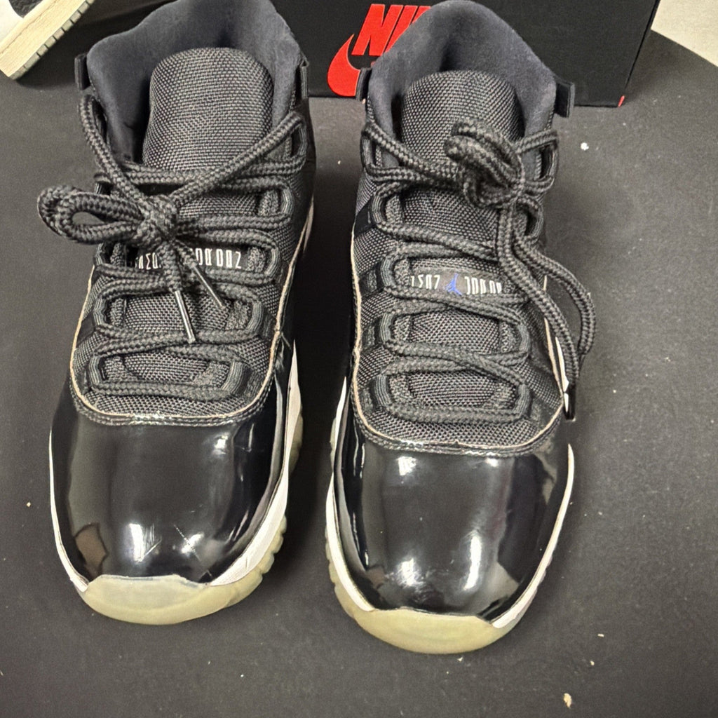 Air Jordan 11 Retro Space Jam High Top Sneaker Black White Concord - product image from the listing.