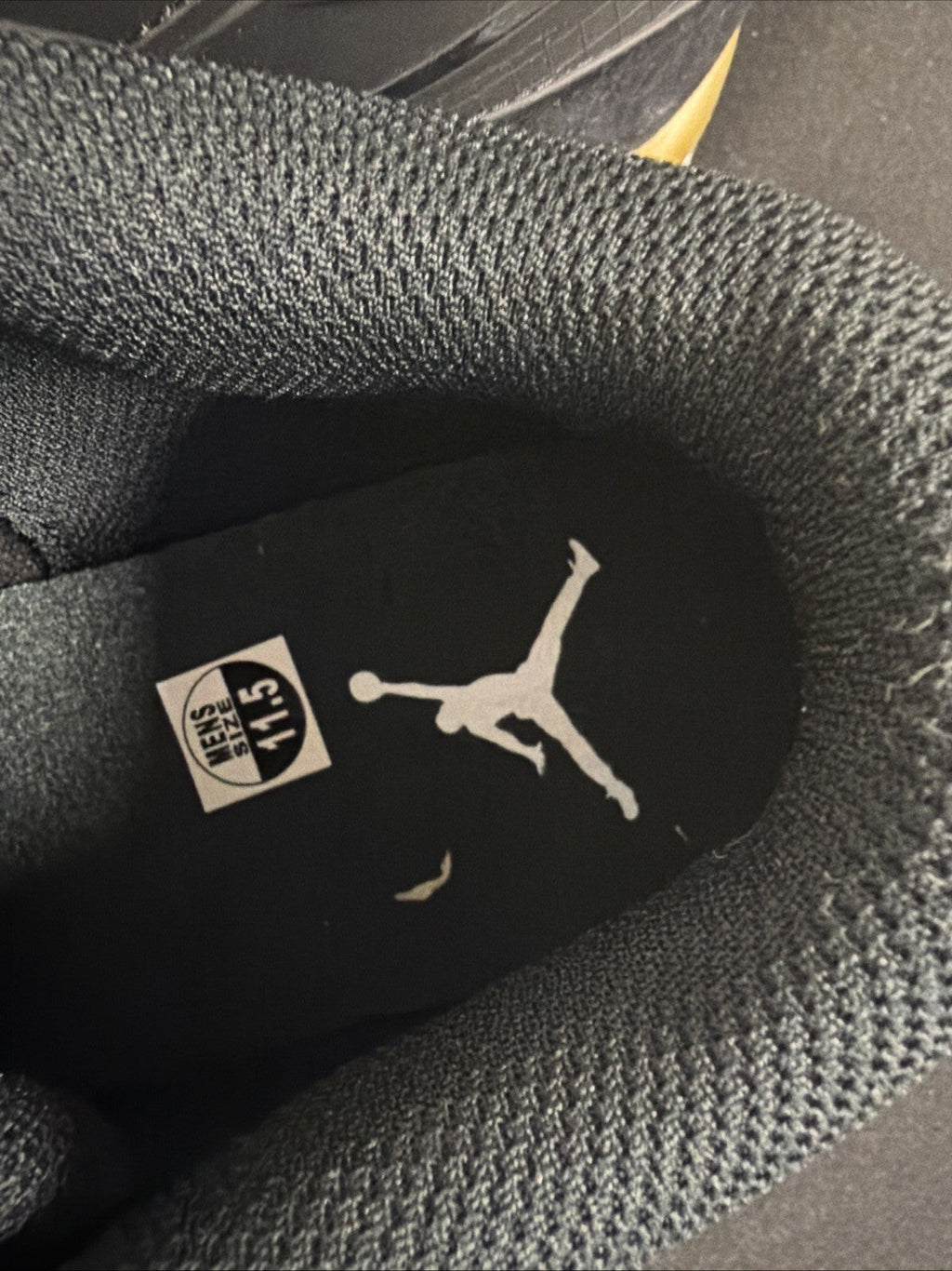 Men's Air Jordan 4 RM Shoes (Black/Sail/Team Gold/Metallic Gold) - product image from the listing.