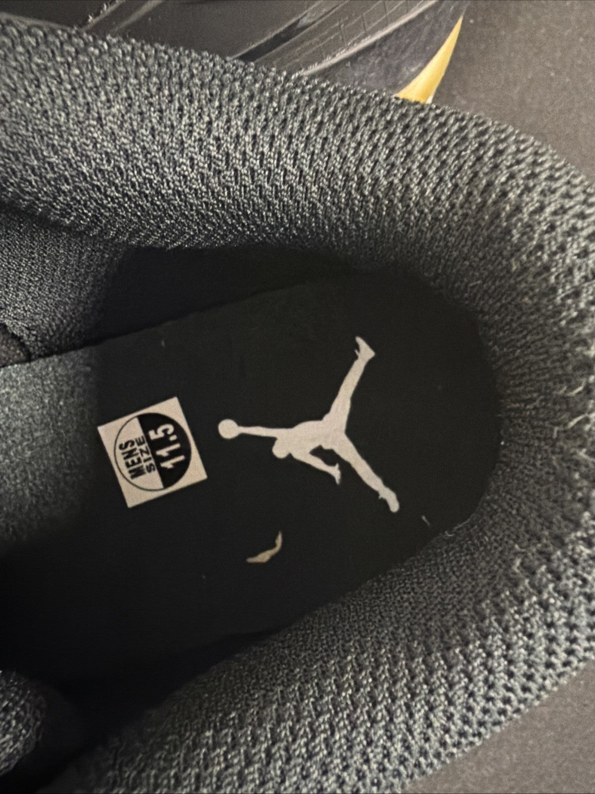 Men's Air Jordan 4 RM Shoes (Black/Sail/Team Gold/Metallic Gold) - product image from the listing.