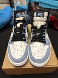 pair of Nike Air Jordan 1 Retro High OG Trainers in the "University Blue 6.5y - product image from the listing.