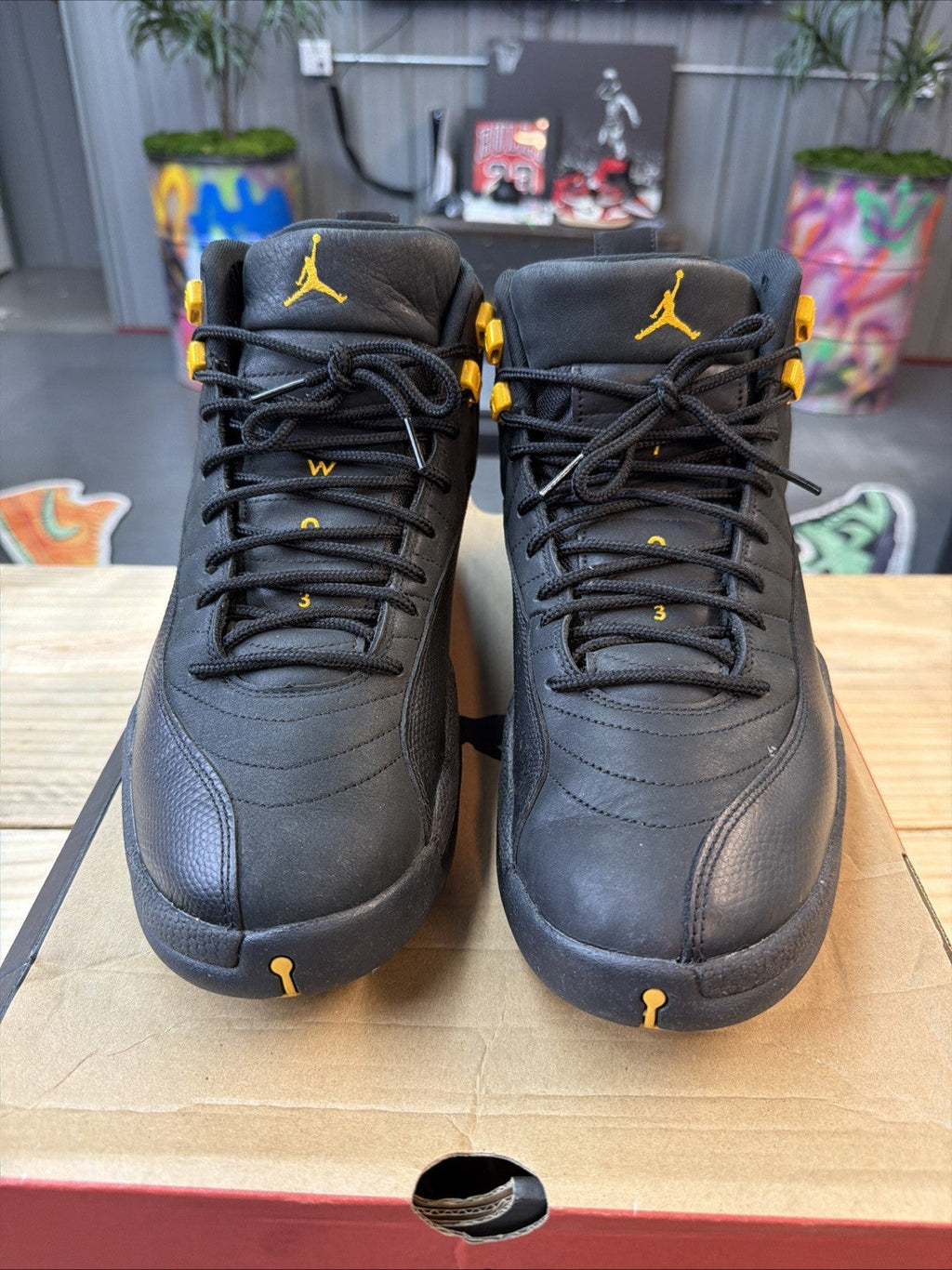 Jordan 12 Retro Mid Black Taxi - Size 14 - product image from the listing.