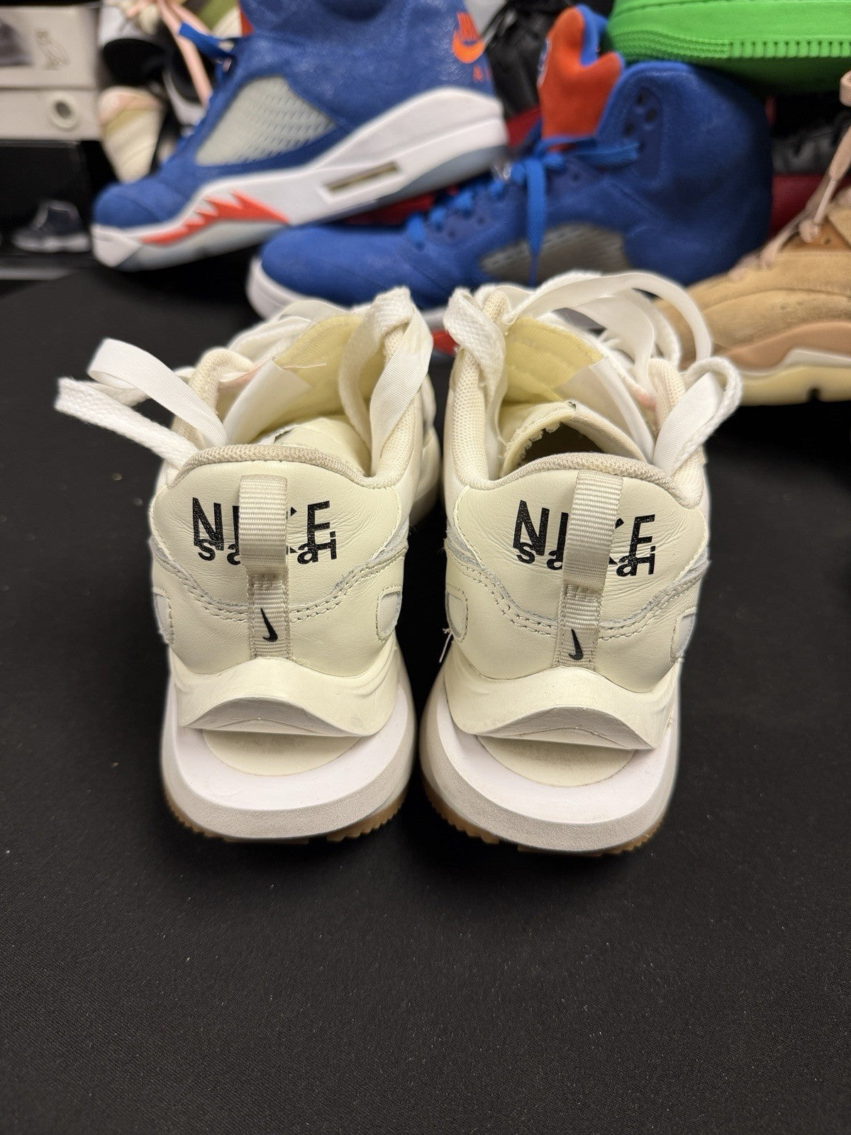 DD1875 100 Nike Vaporwaffle sacai in Sail Gum - product image from the listing.