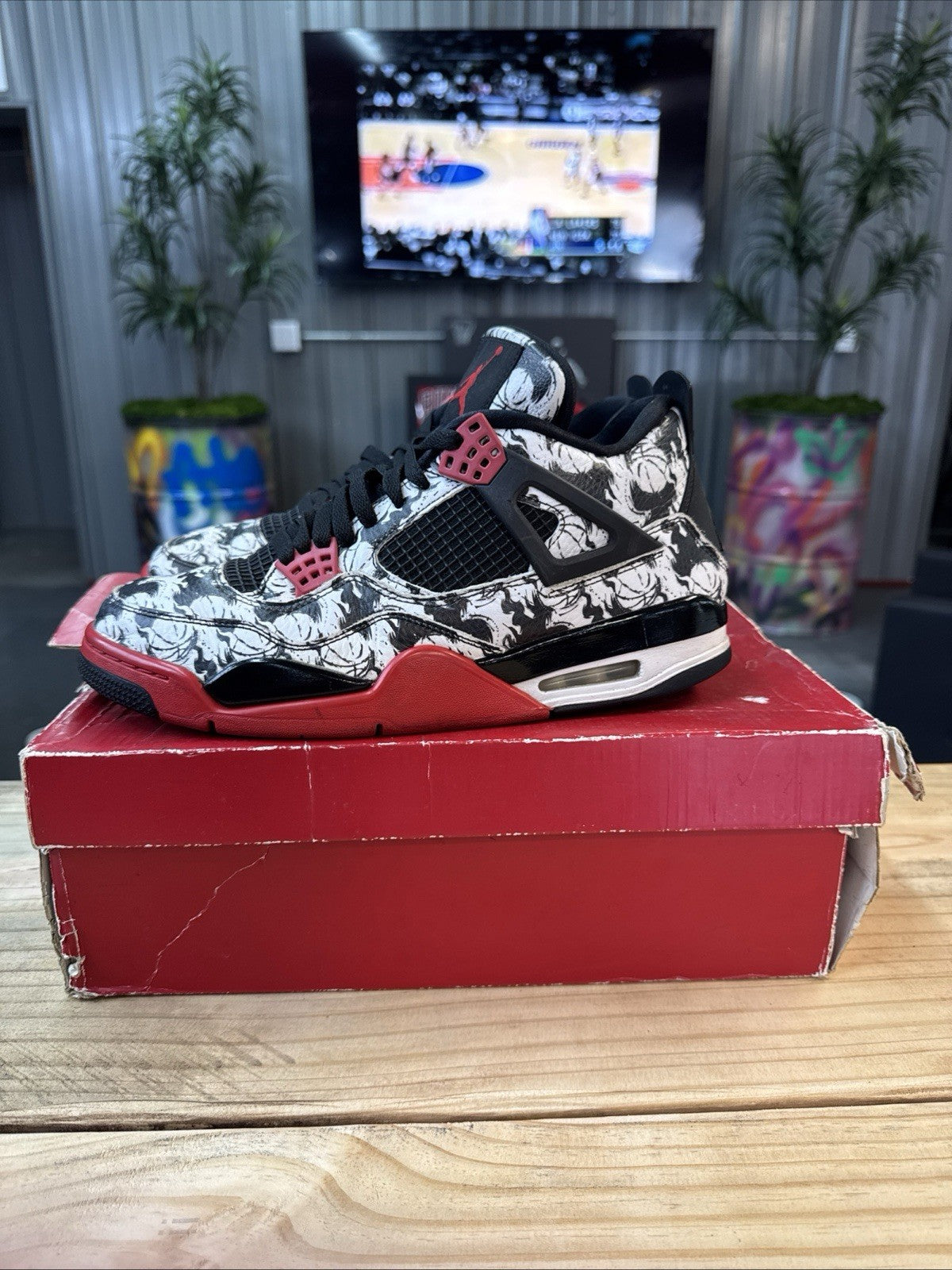 "Tattoo" size 11 - (2018) Jordan 4 - product image from the listing.
