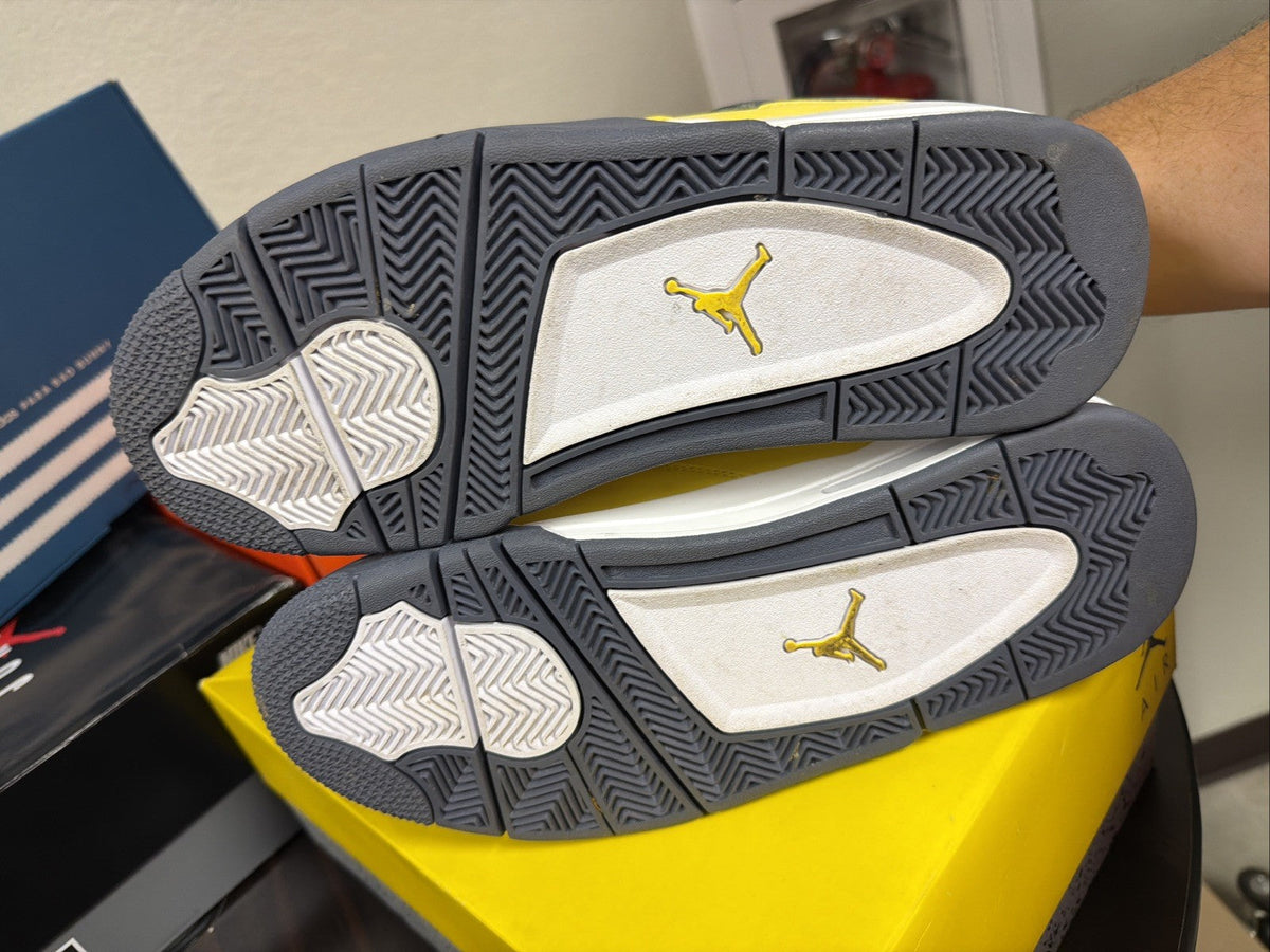 Air Jordan 4 Retro Tour Yellow/Dark in Blue Grey - product image from the listing.