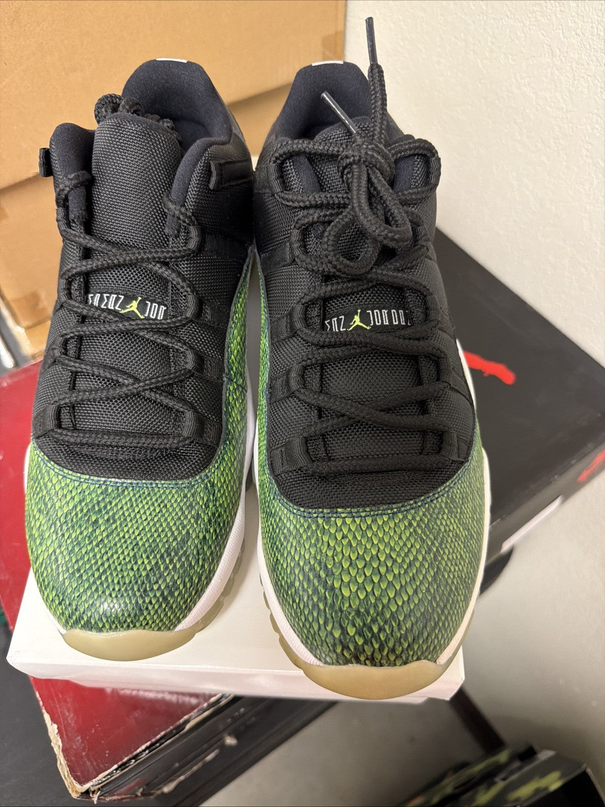 Men's Jordan 11 Low Snakeskin Size 12 Green Black Snakeskin - product image from the listing.
