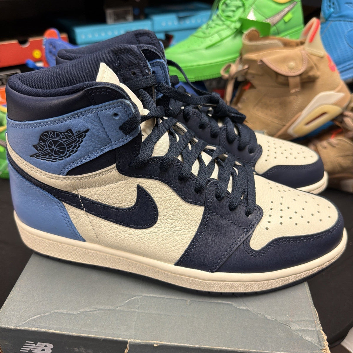 "UNC" Air Jordan 1 High OG Sail/Obsidian-University Blue Size 9.5 555088-140 - product image from the listing.