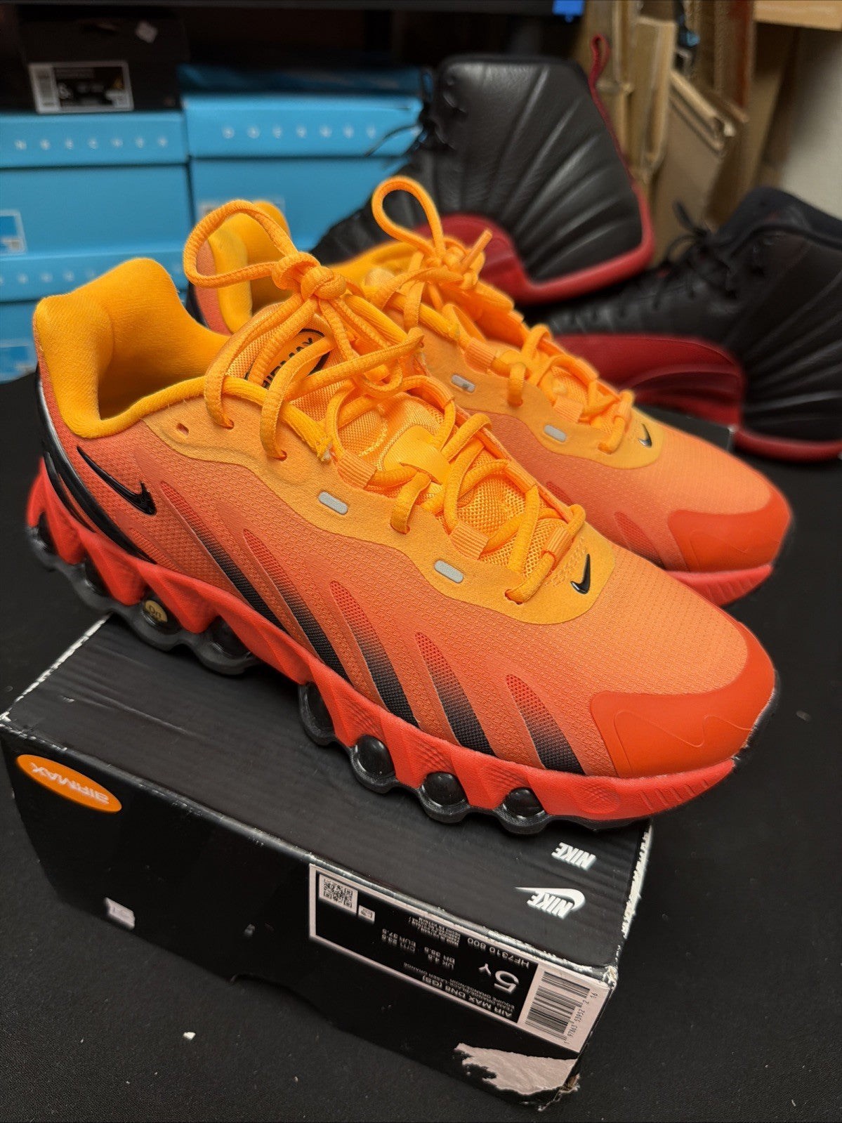 (GS) HF7310 800 Laser Orange Black Youth Athletic Shneakers - Nike Air Max Dn8 - product image from the listing.