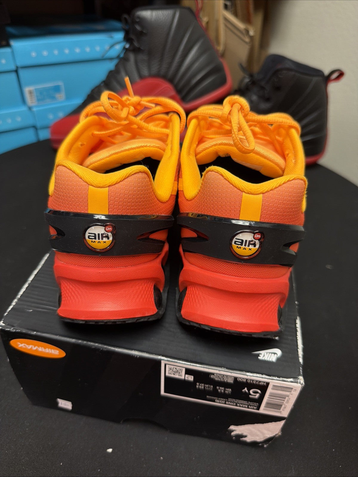 (GS) HF7310 800 Laser Orange Black Youth Athletic Shneakers - Nike Air Max Dn8 - product image from the listing.