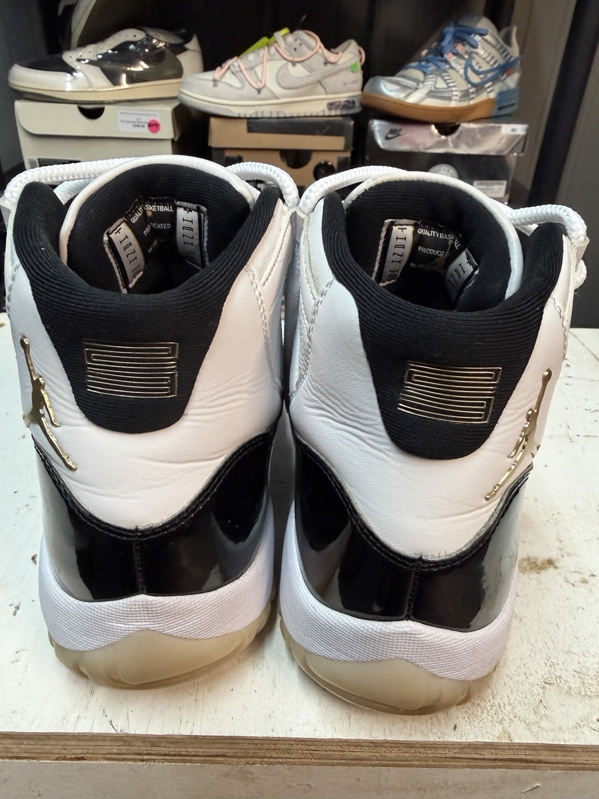 Air Jordan 11 Retro Gratitude White/Black/Gold Mid Top CT8012-170 2023 - product image from the listing.