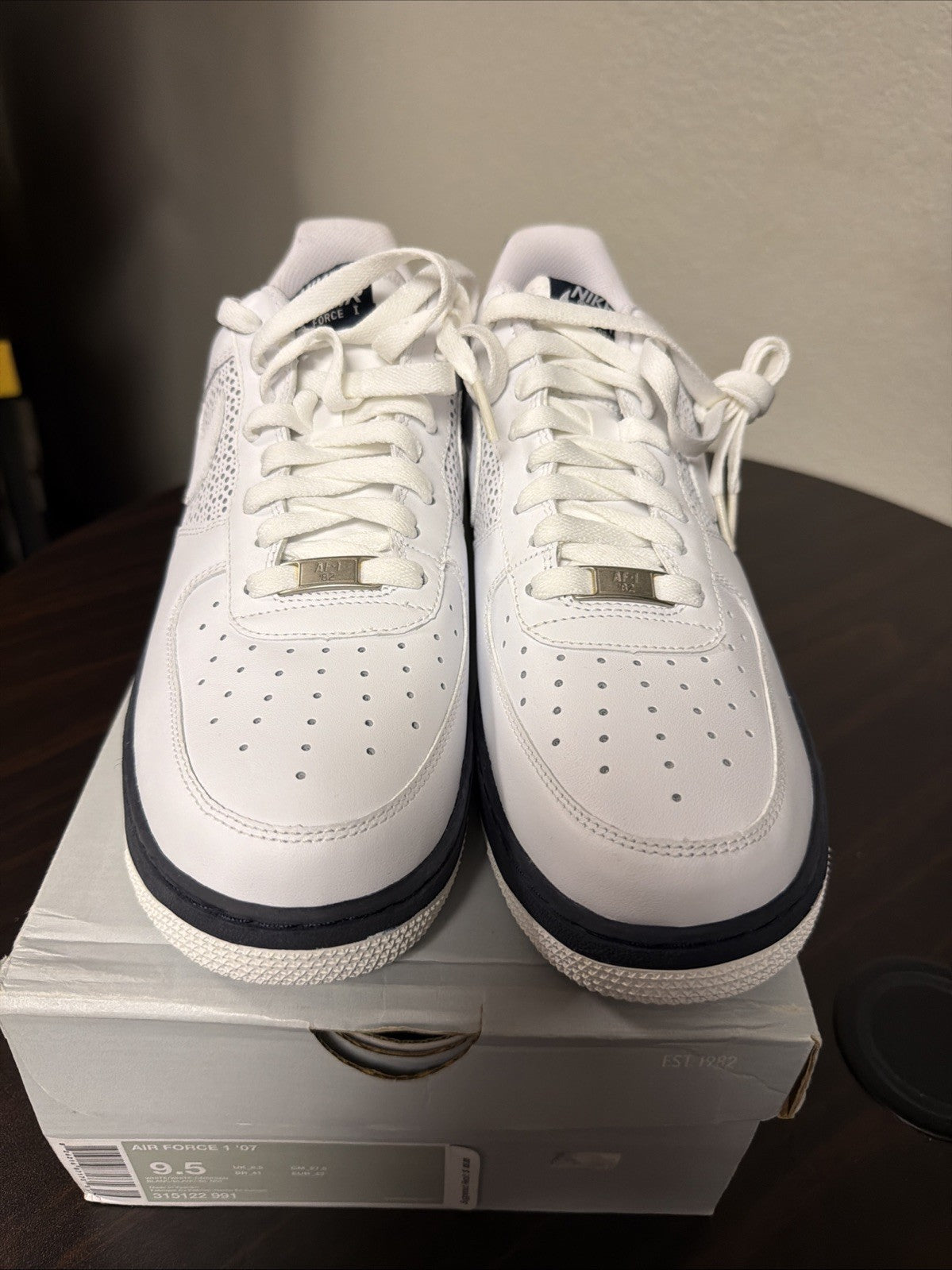 "White Obsidian" Nike Air Force 1 '07 White Navy Size 9.5 315122-991 2008 - product image from the listing.