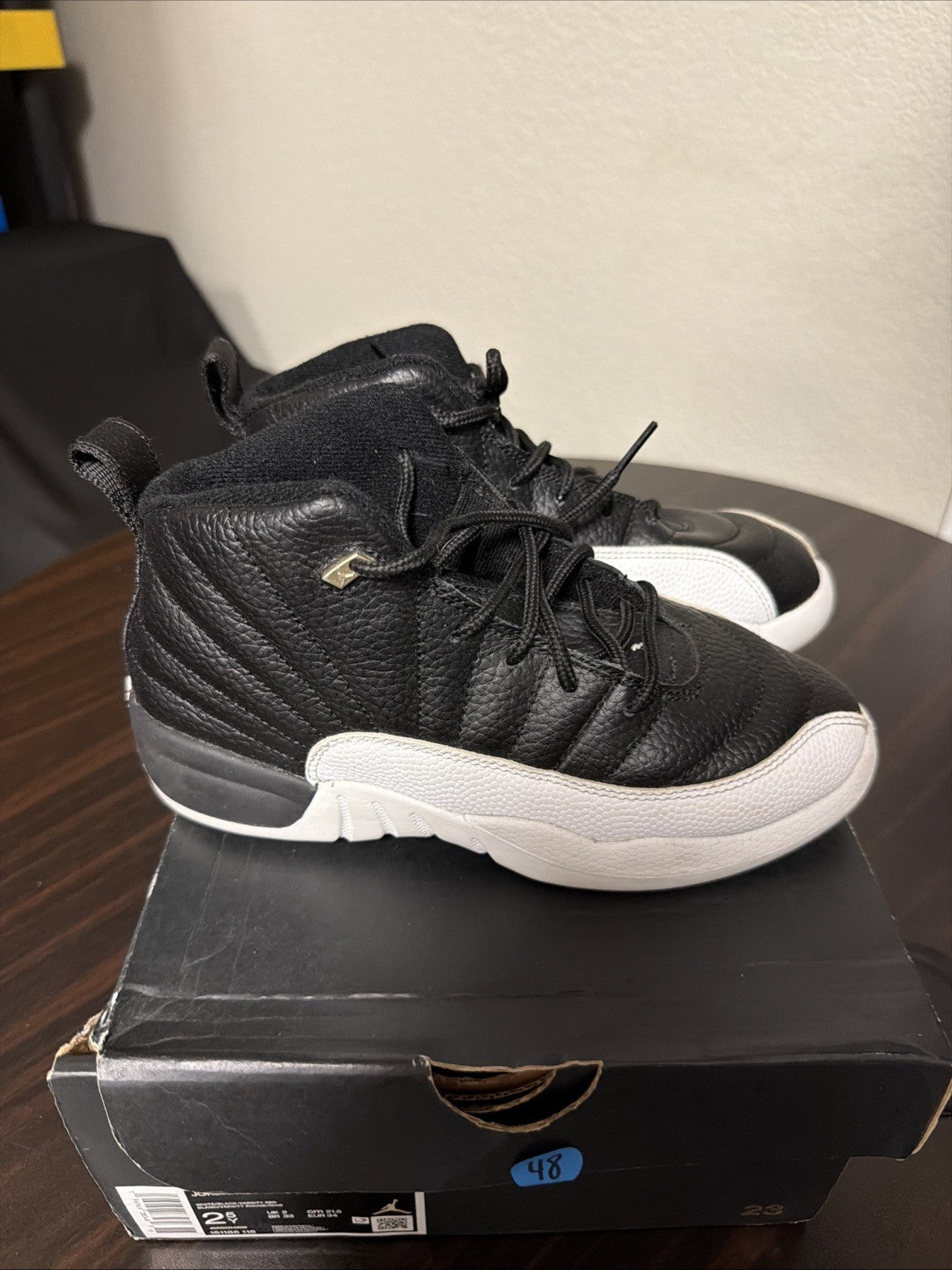 Air Jordan 12 Retro Playoff 2022 GS Size 2.5y (6W) 153265-006 *In Hand* in Black - product image from the listing.