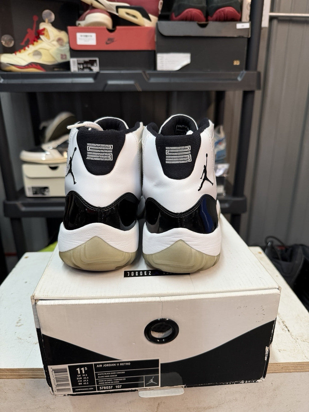 Concord 2011 White Black Size 11.5 Sneakers - Nike Air Jordan 11 Retro 378037-107 - product image from the listing.