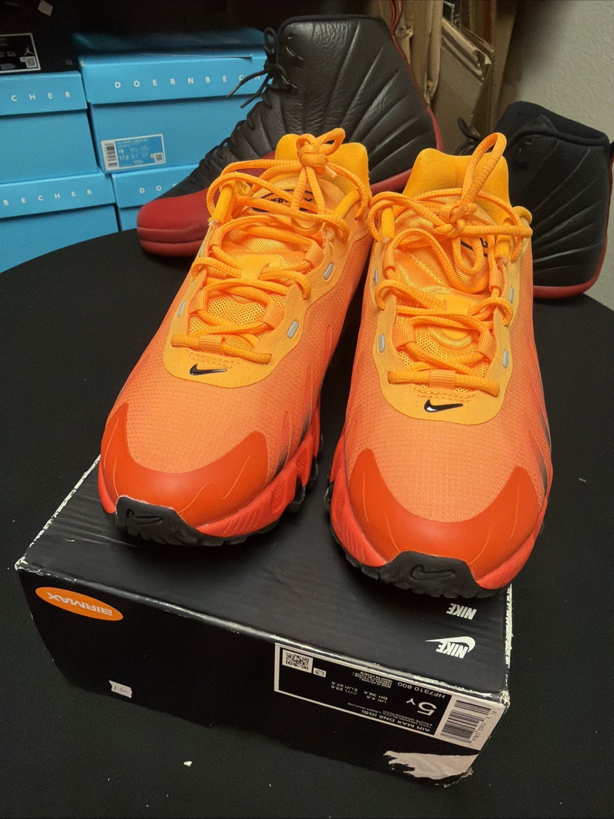 (GS) HF7310 800 Laser Orange Black Youth Athletic Shneakers - Nike Air Max Dn8 - product image from the listing.