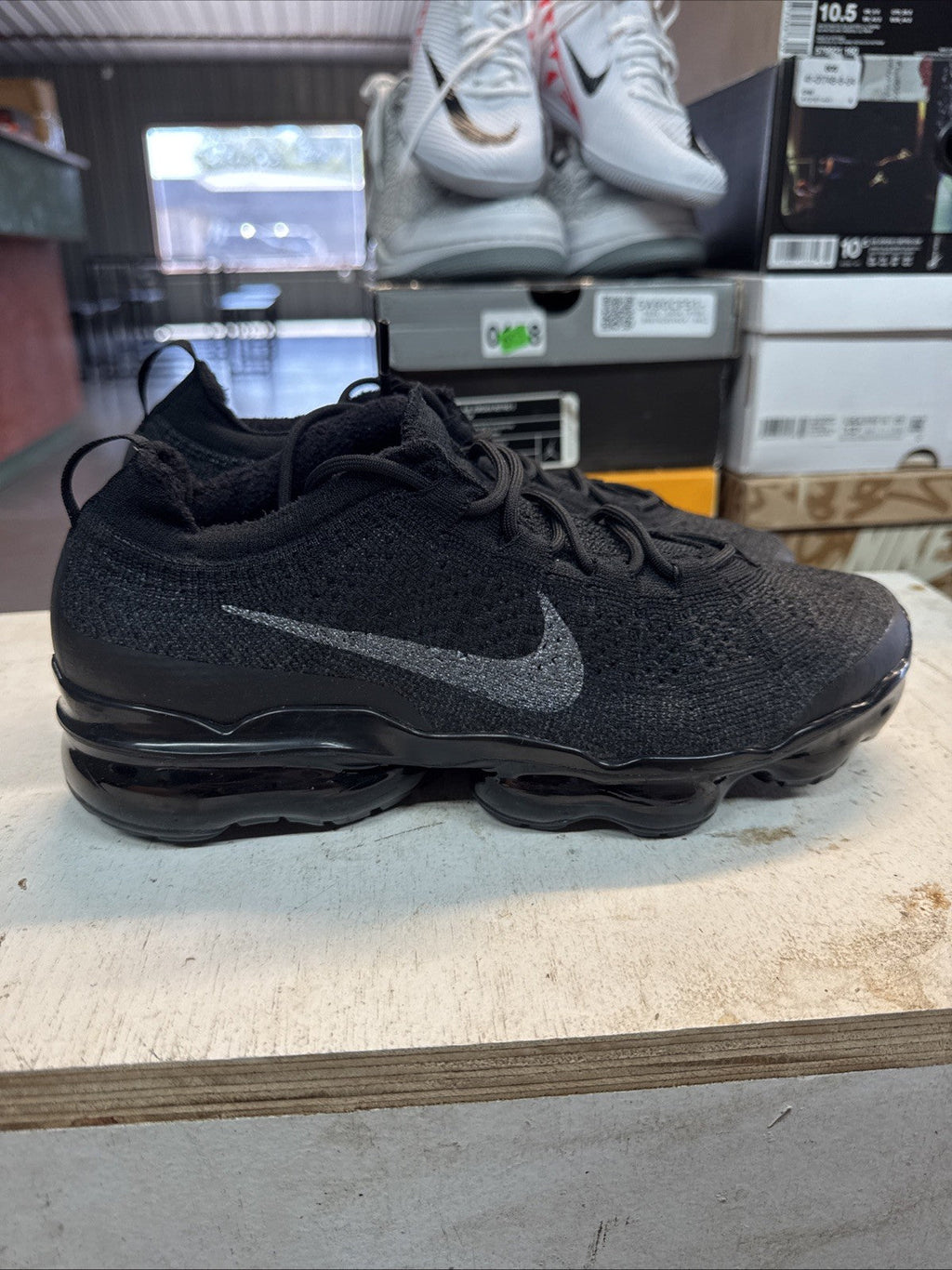Size 10.5 - Nike Air Vapormax Flyknit Triple Black | Replacement Box for Women - product image from the listing.