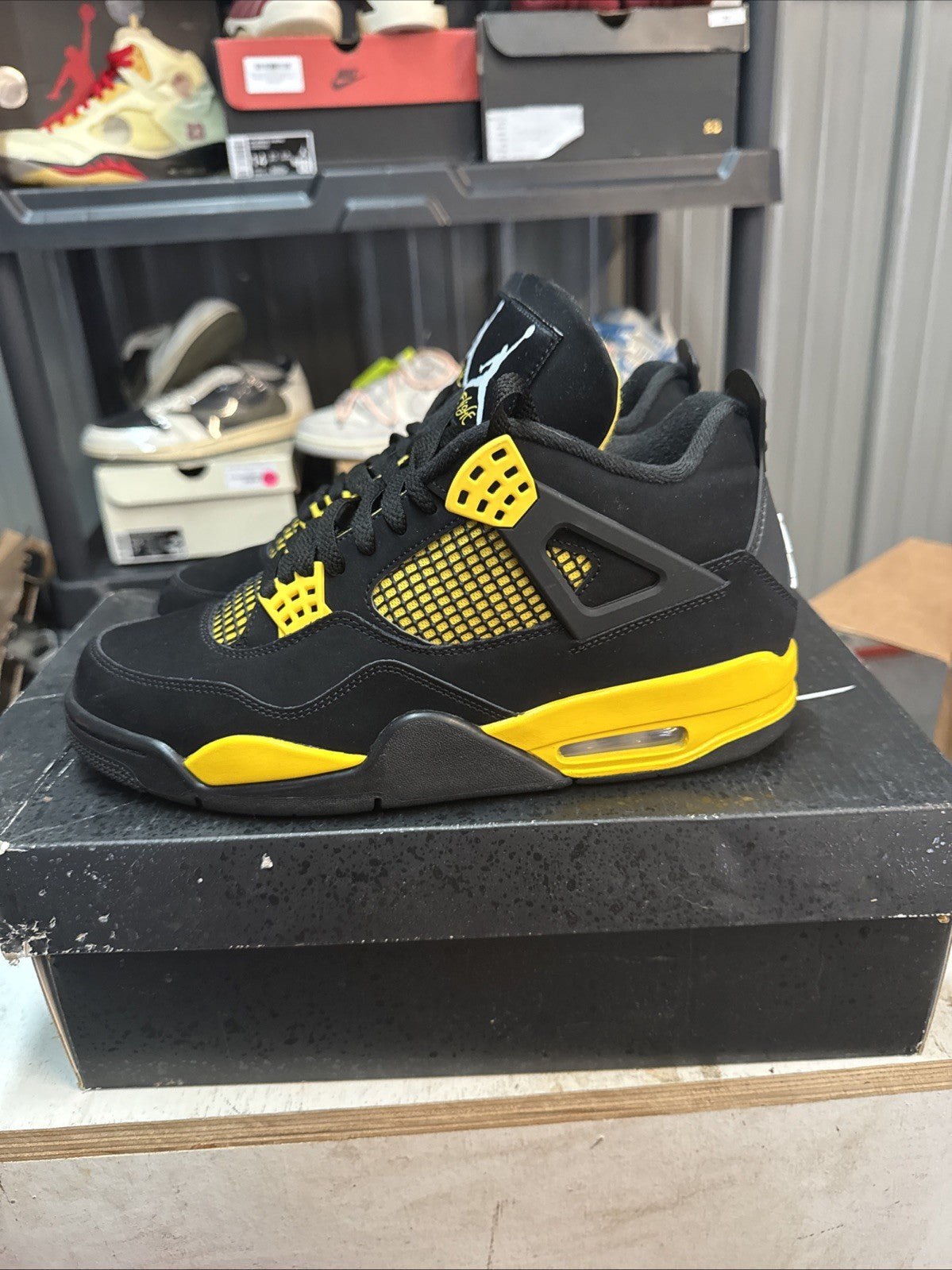 Jordan 4 Retro Mid Thunder | Worn Once - Size 10 - product image from the listing.