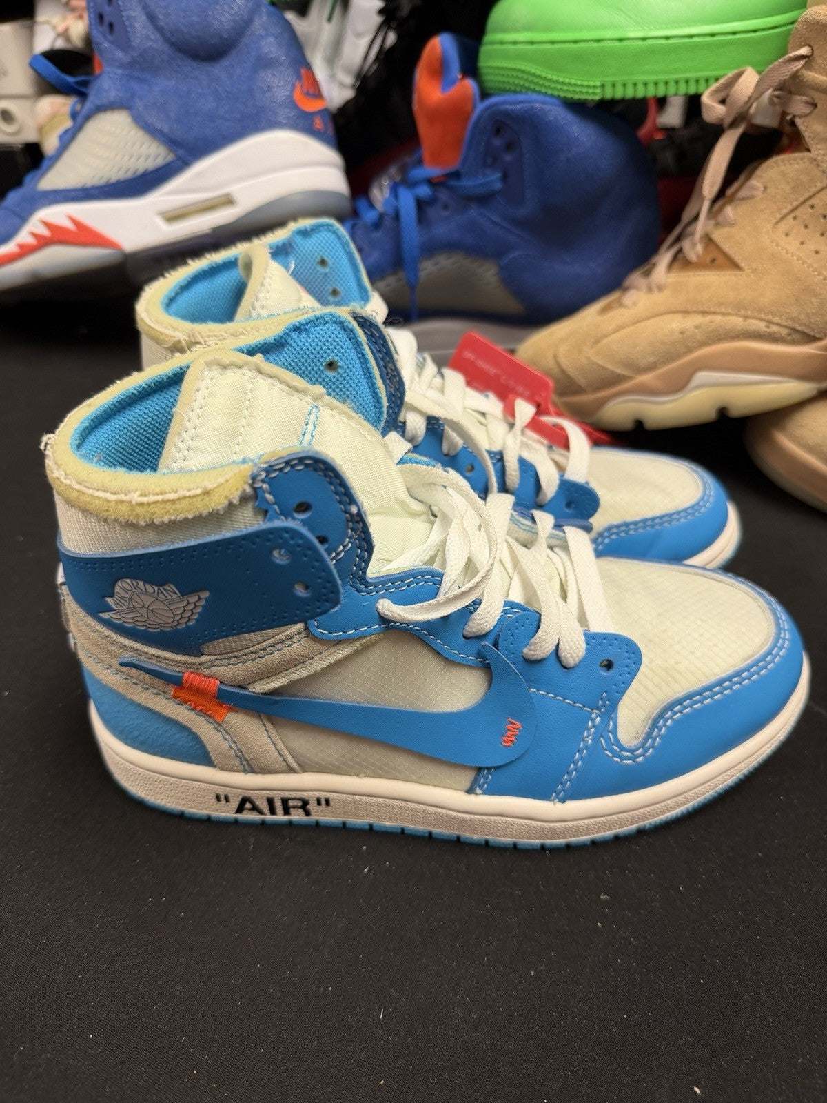 Pre-owned, Size 4.5 - Off-White Jordan 1 UNC - product image from the listing.