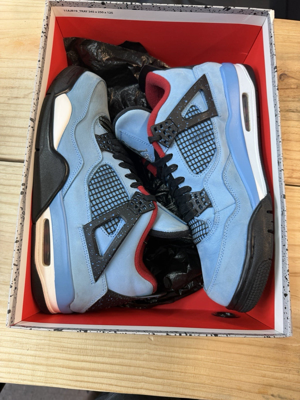 Travis Scott 4s Size 11 - product photo shown in the listing for this item.