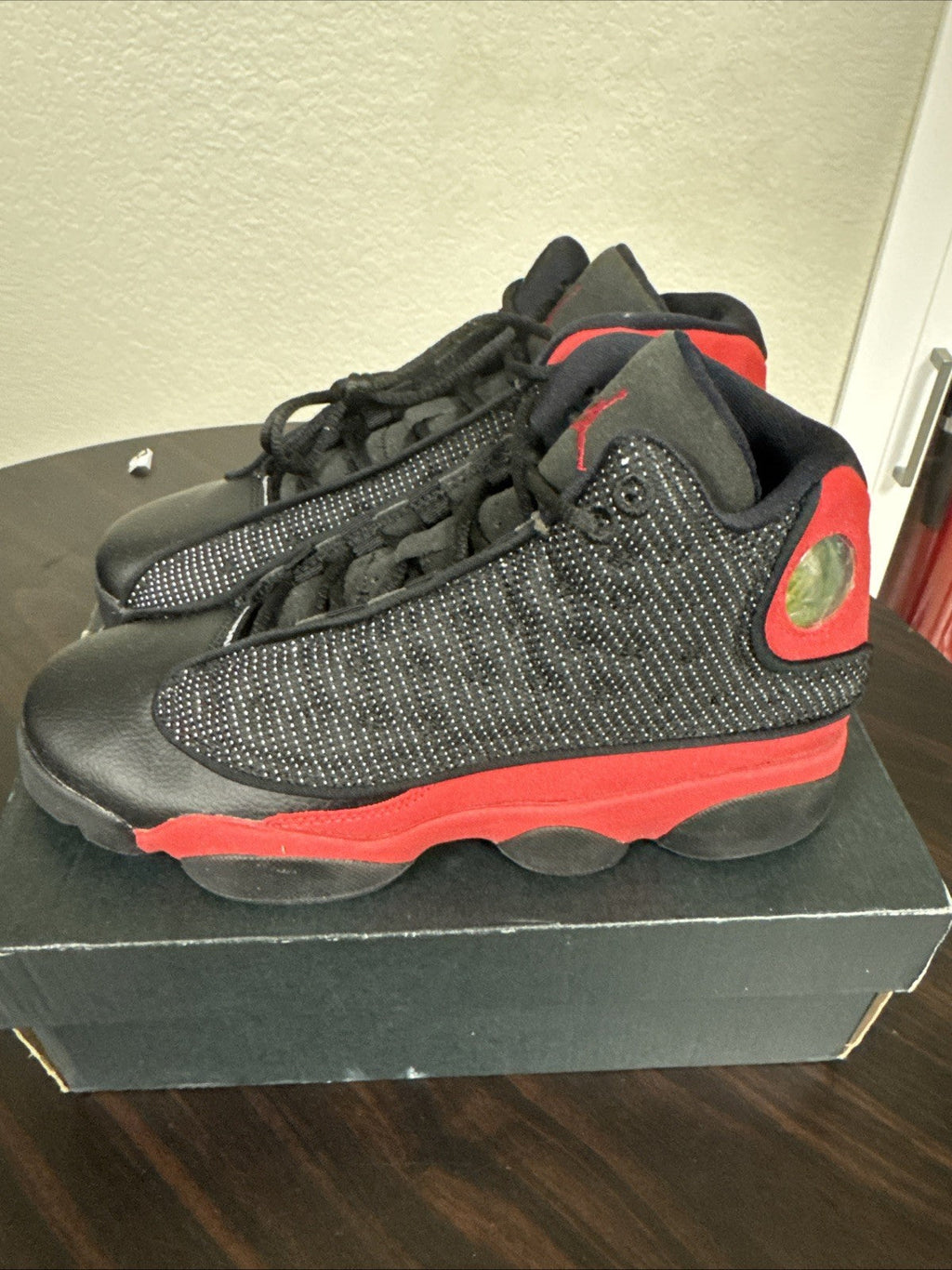 "Bred" NIKE Air Jordan 13 Retro GS 2017 BLACK/ TRUE RED 414574-004 Youth 5y - product image from the listing.