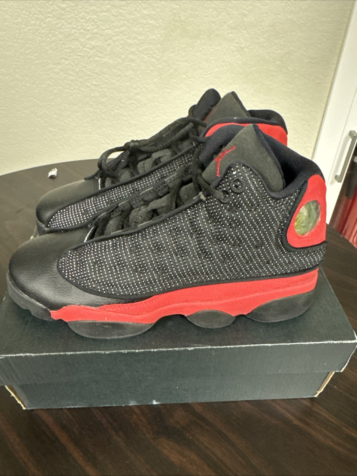 "Bred" NIKE Air Jordan 13 Retro GS 2017 BLACK/ TRUE RED 414574-004 Youth 5y - product image from the listing.