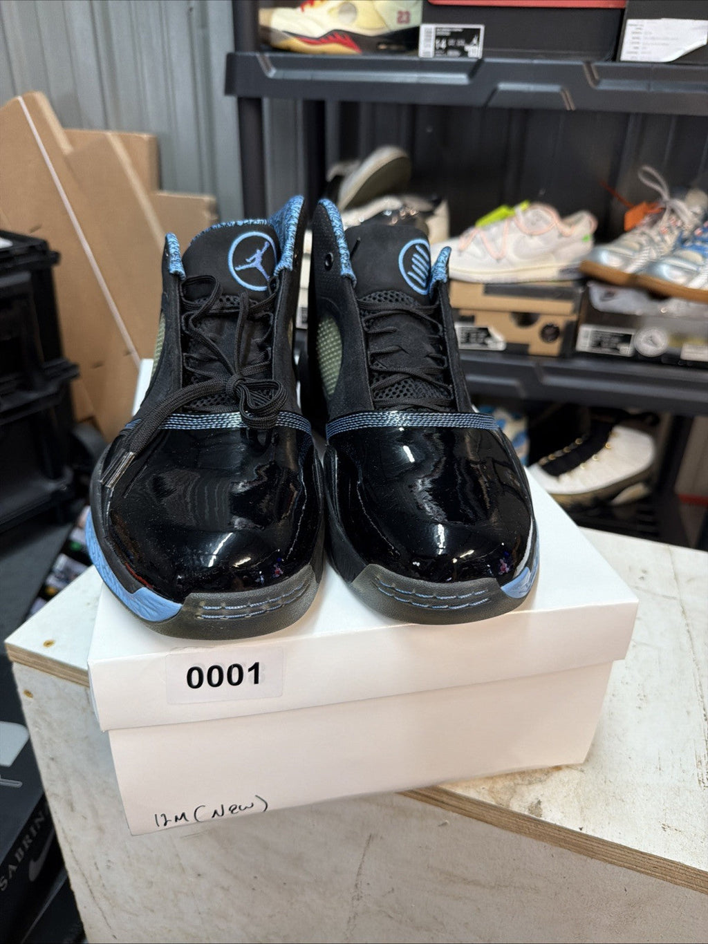 Men's Air Jordan 2010 Black Uni Blue Leather Athletic Shoes Size 12 387358-003 - product image from the listing.