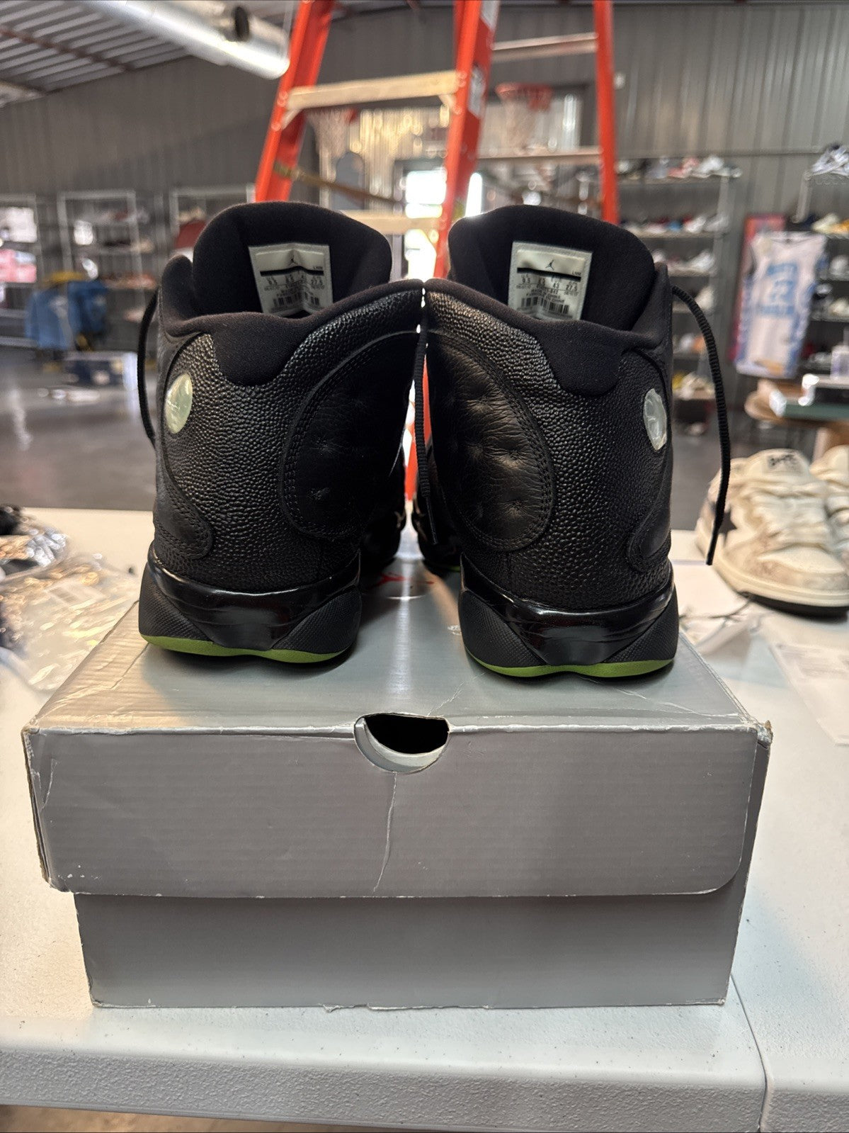 Air Jordan 13 Retro Black Altitude Green - Size 9.5 - product image from the listing.