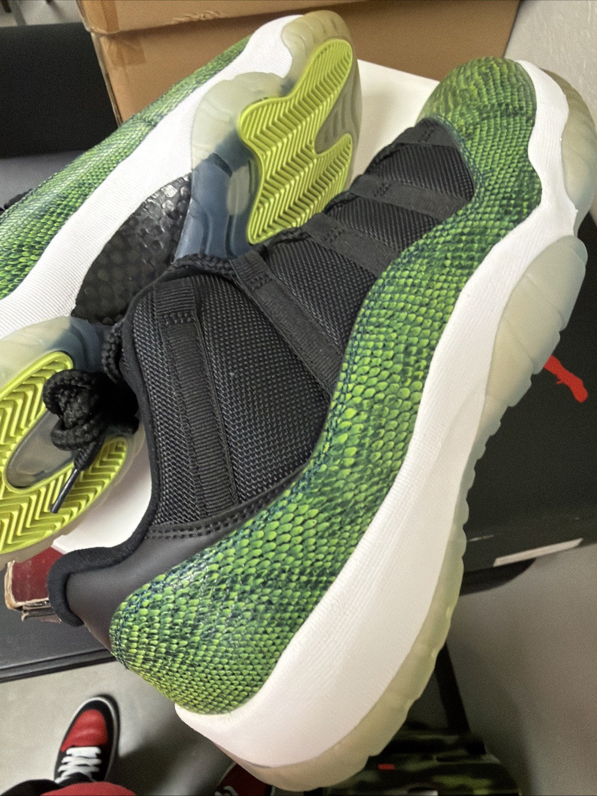 Men's Jordan 11 Low Snakeskin Size 12 Green Black Snakeskin - product image from the listing.