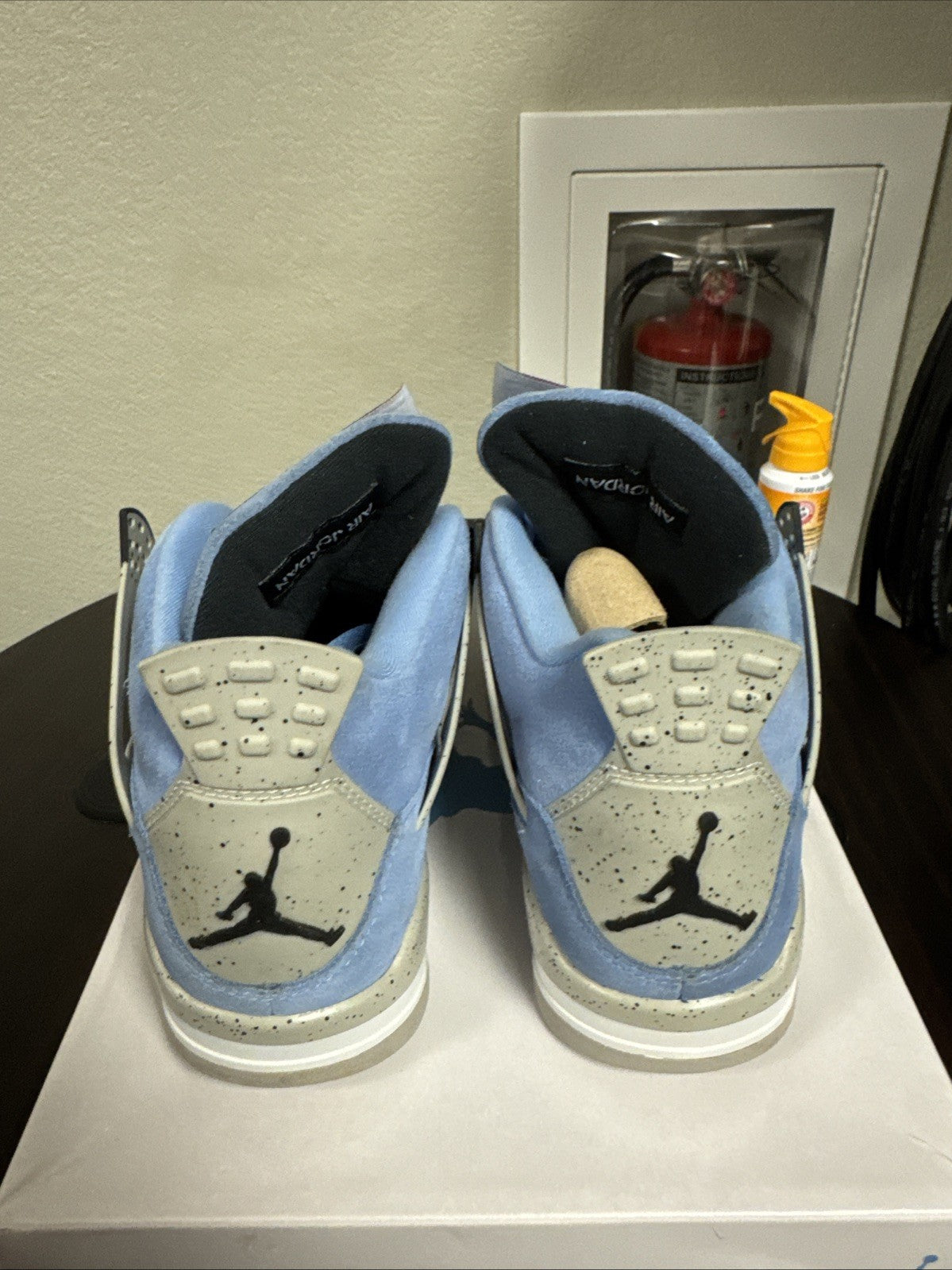 Air Jordan 4 Retro university blue men's size 9￼ - product image from the listing.