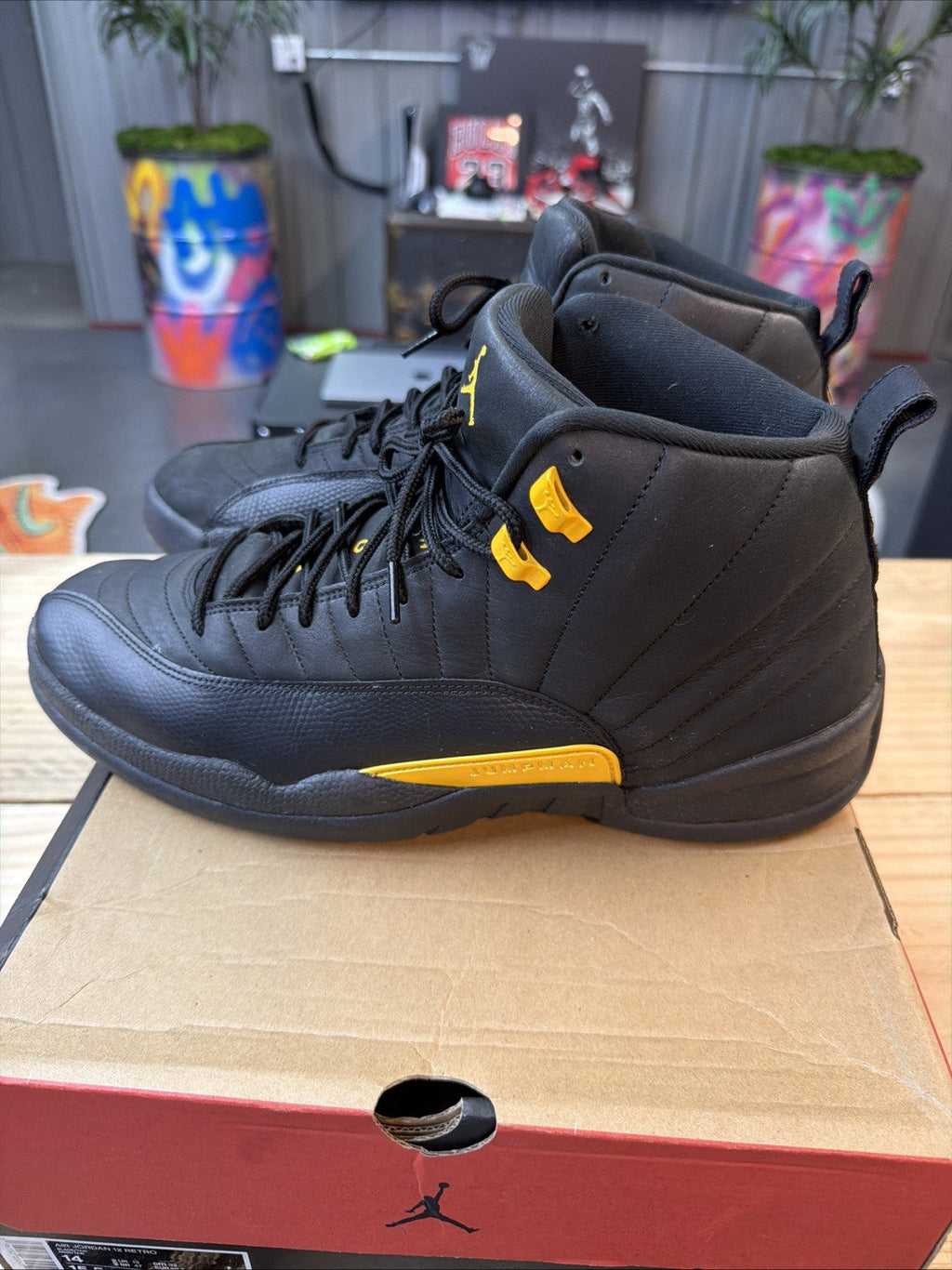 Jordan 12 Retro Mid Black Taxi - Size 14 - product image from the listing.