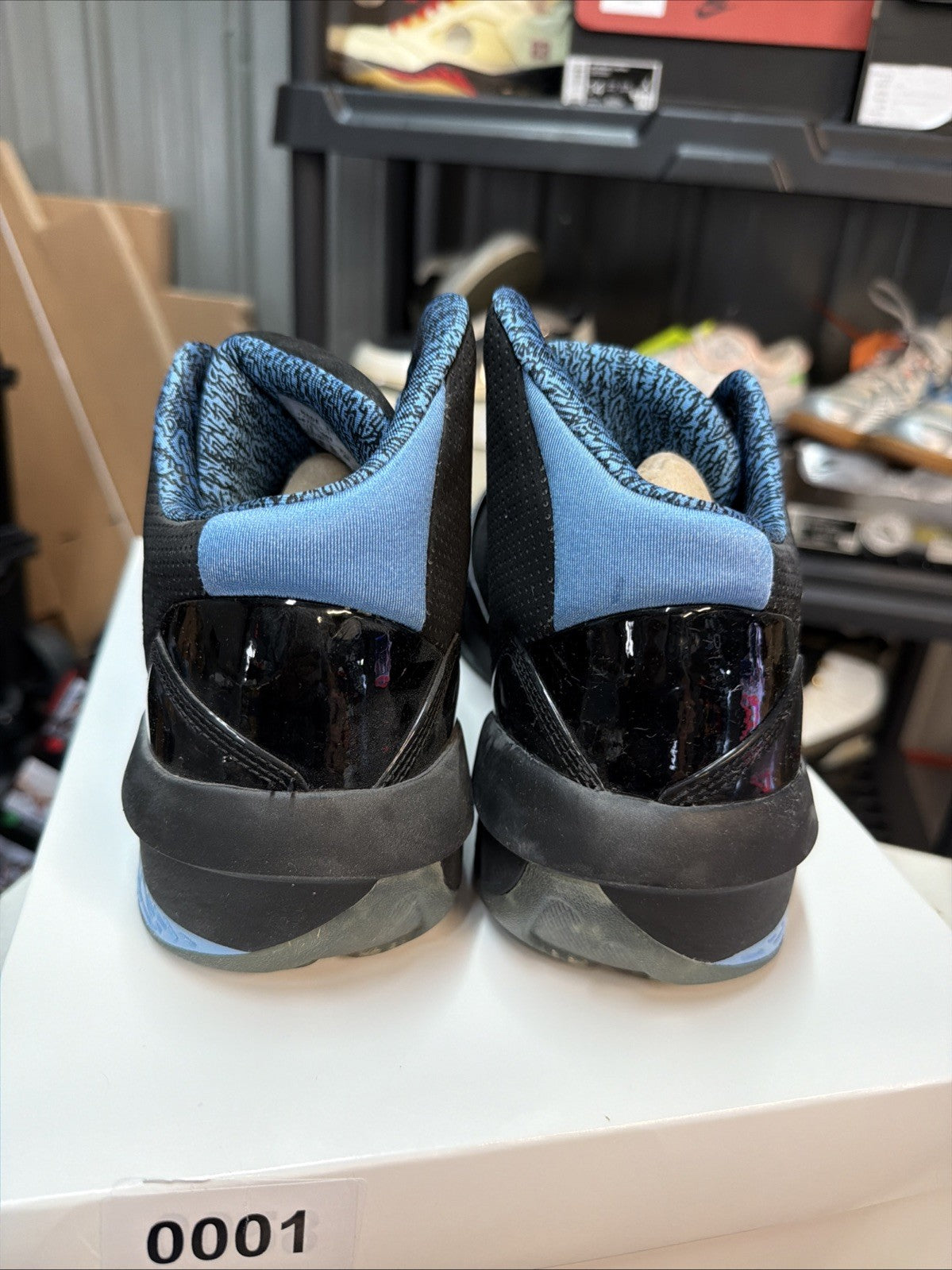 Men's Air Jordan 2010 Black Uni Blue Leather Athletic Shoes Size 12 387358-003 - product image from the listing.