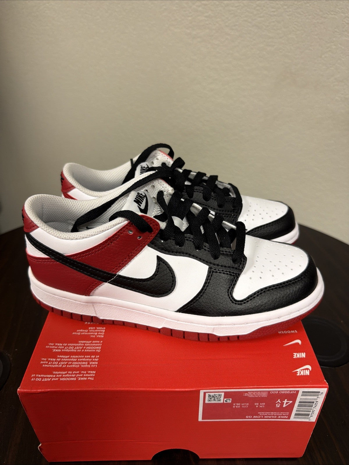Gym Red/White/Black - Nike Dunk Low Big Kids' Shoes - product image from the listing.