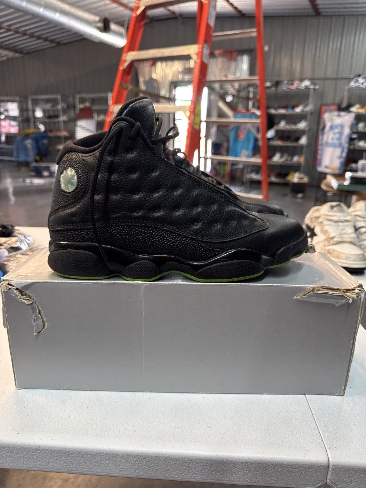 Air Jordan 13 Retro Black Altitude Green - Size 9.5 - product image from the listing.