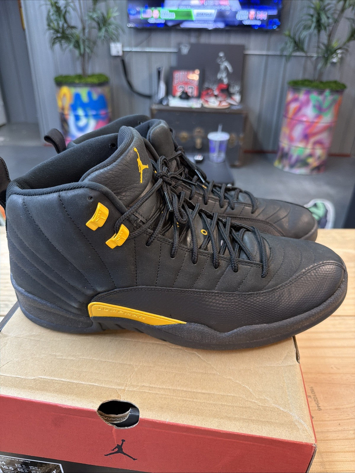 Jordan 12 Retro Mid Black Taxi - Size 14 - product image from the listing.