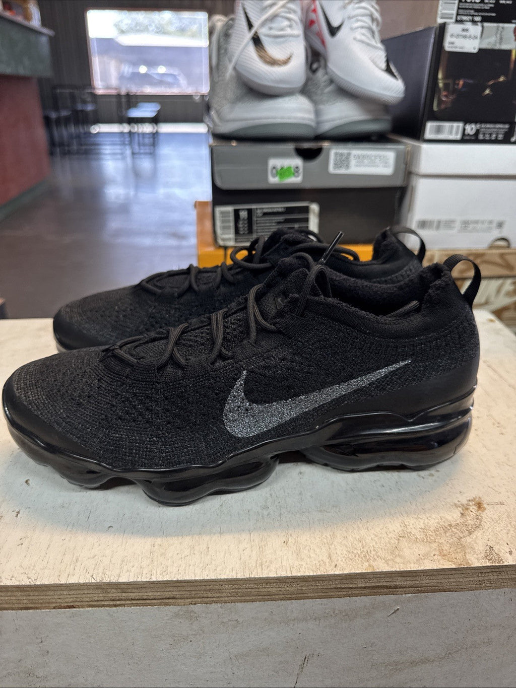 Size 10.5 - Nike Air Vapormax Flyknit Triple Black | Replacement Box for Women - product image from the listing.