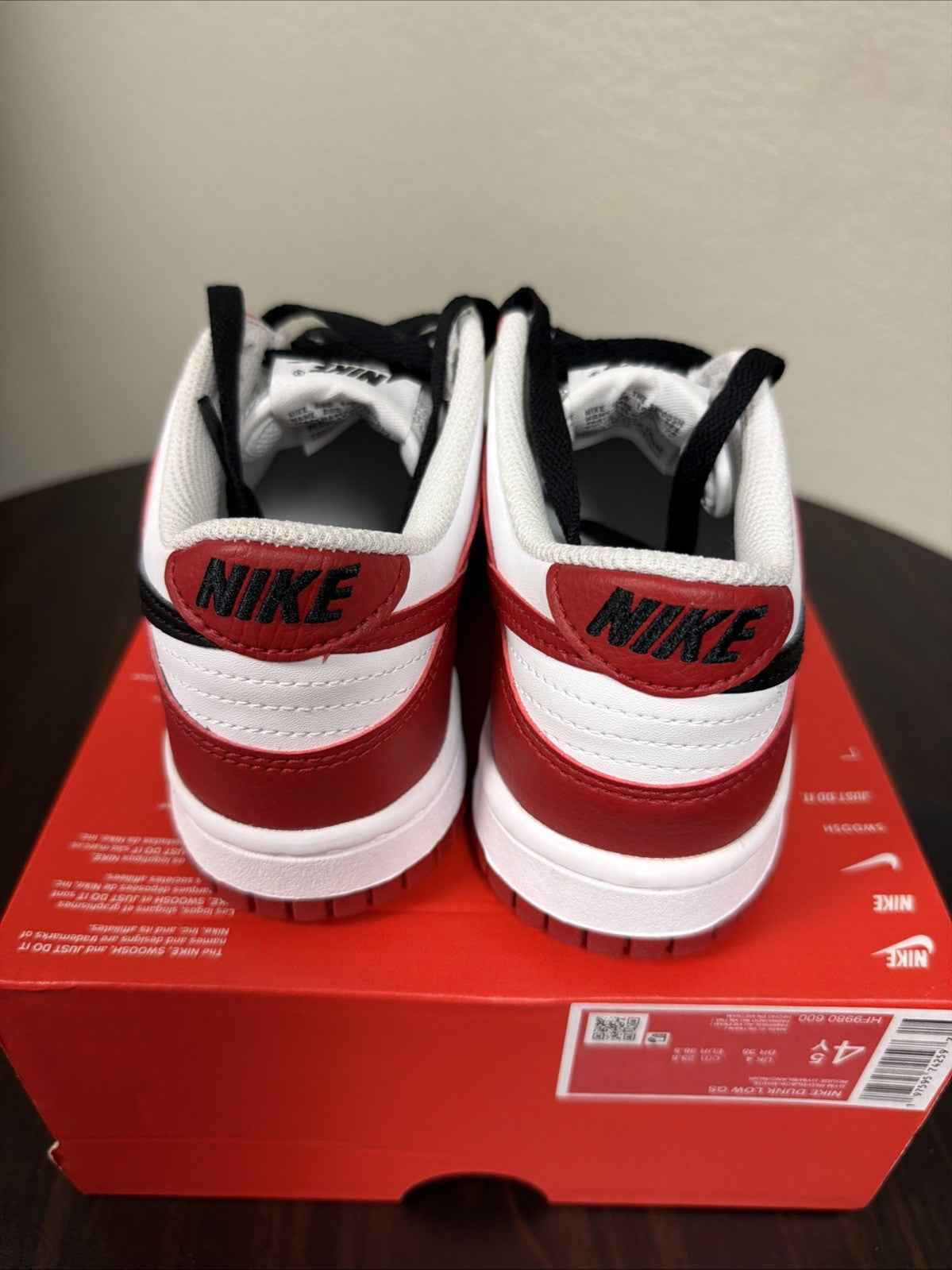 Gym Red/White/Black - Nike Dunk Low Big Kids' Shoes - product image from the listing.