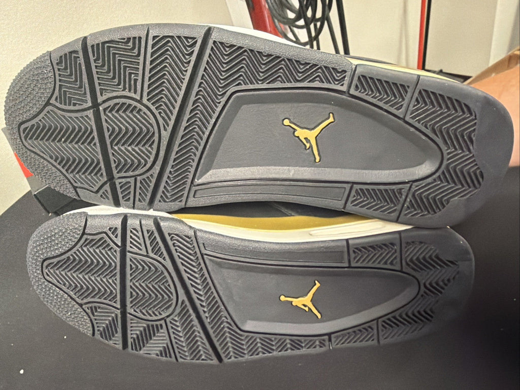 Men's Air Jordan 4 RM Shoes (Black/Sail/Team Gold/Metallic Gold) - product image from the listing.
