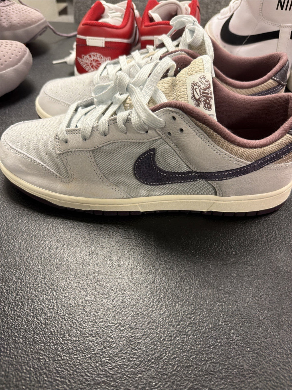 Nike Dunk Low Retro SE Off White/Dark Raisin (IB6752 100) for Men - product image from the listing.