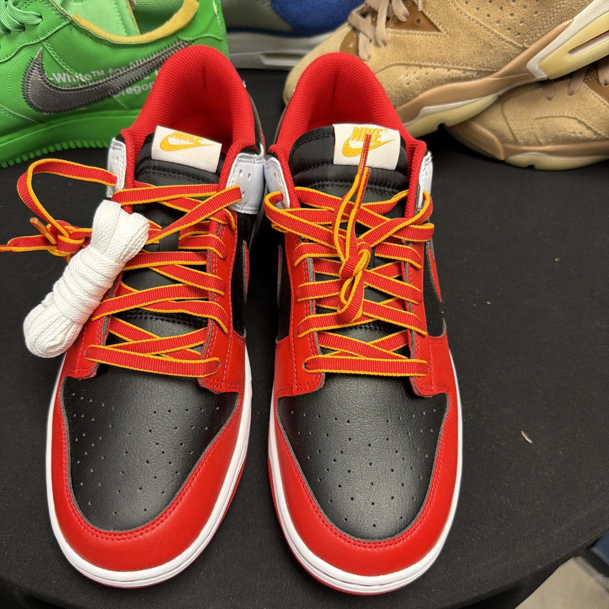Men's Nike Dunk Low Retro Black White University Gold Red | Size 11.5 - product image from the listing.
