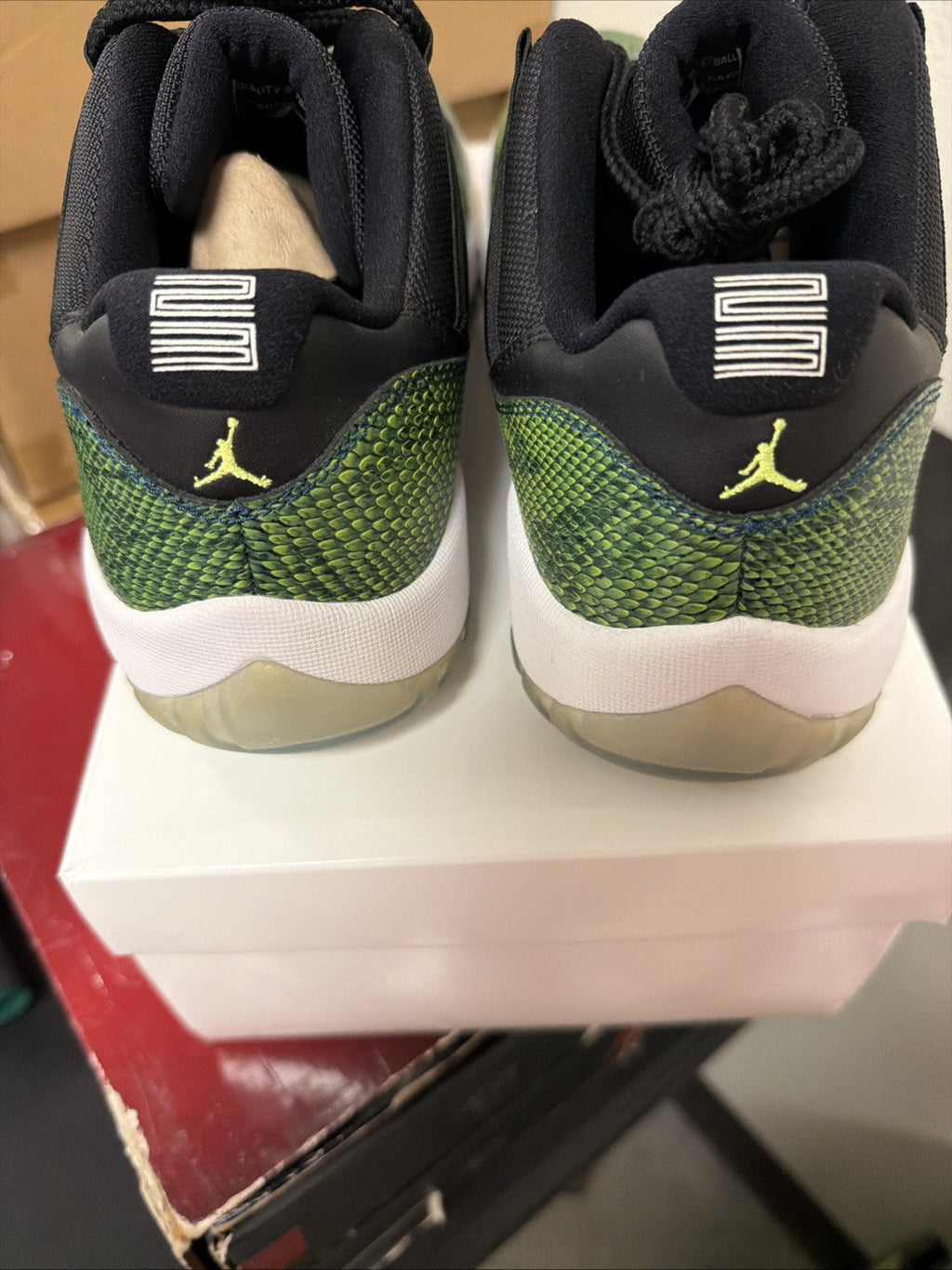 Men's Jordan 11 Low Snakeskin Size 12 Green Black Snakeskin - product image from the listing.