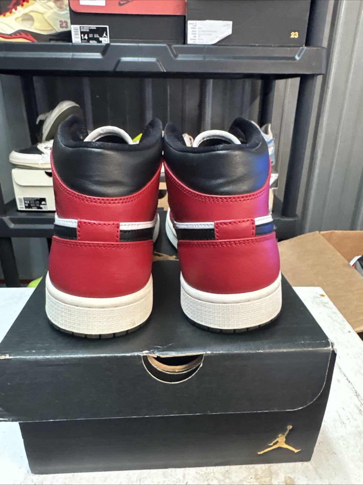 - Red, Black & White Chicago Size 9 MJ - Nike Air Jordan 1 Mid - product image from the listing.