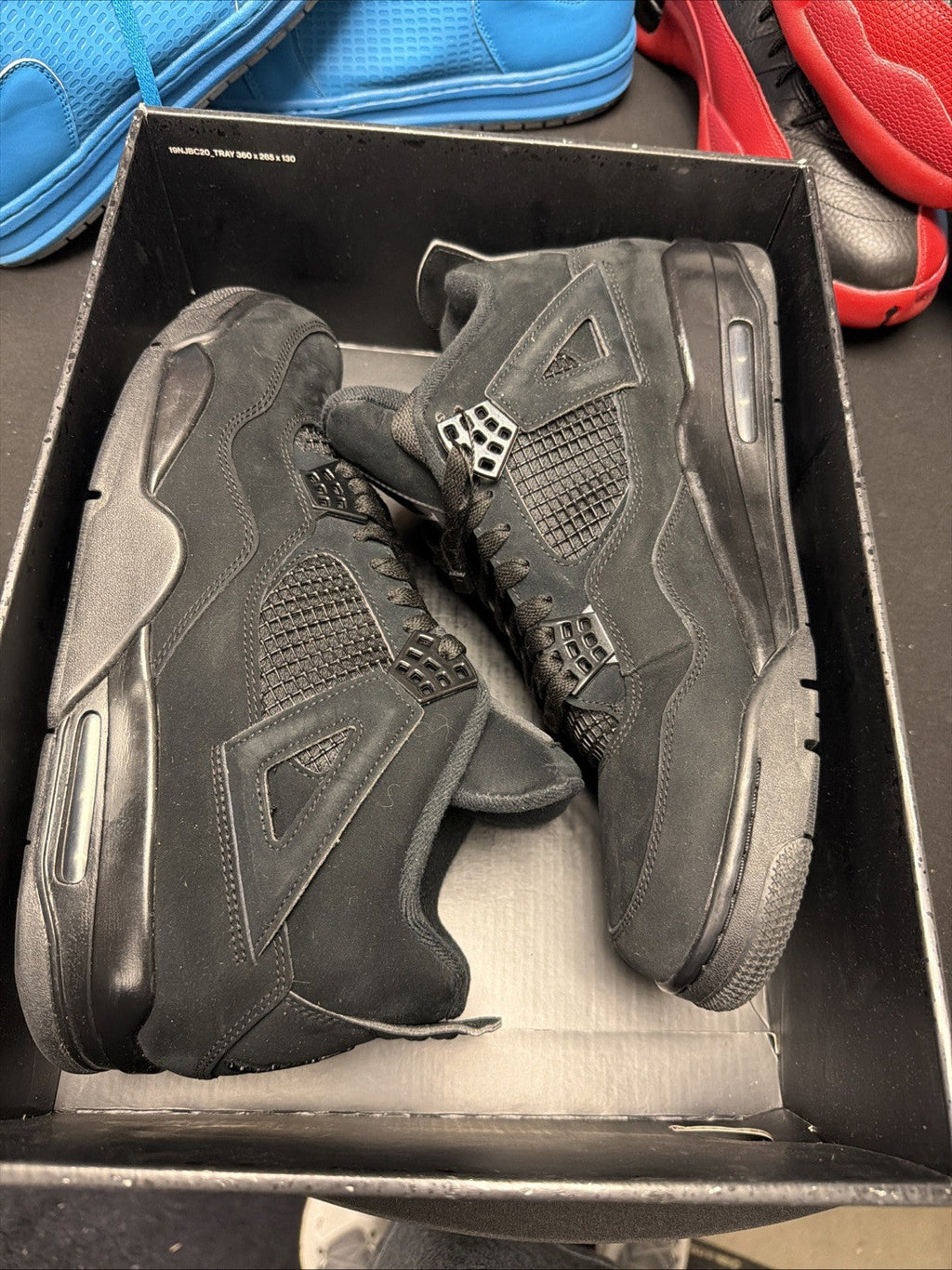 Jordan 4 Retro Mid Black Cat - Size 12 - product image from the listing.