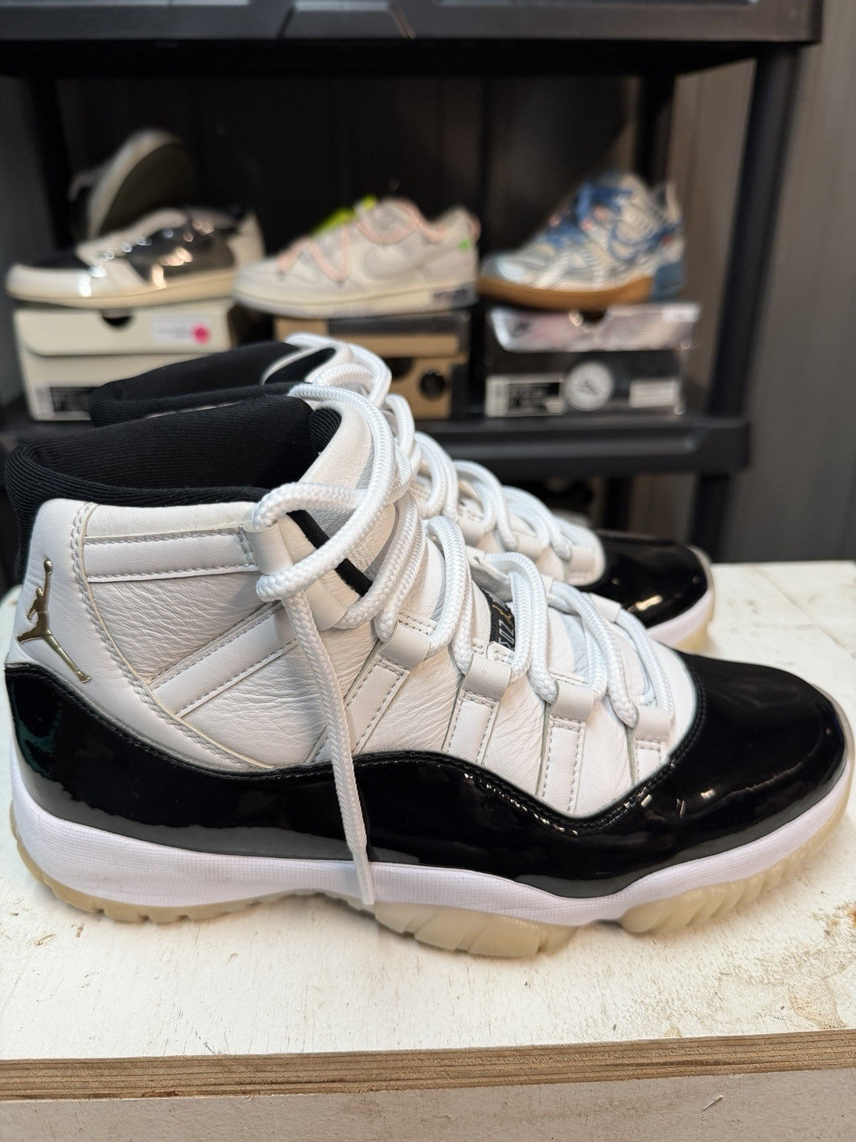 Air Jordan 11 Retro Gratitude White/Black/Gold Mid Top CT8012-170 2023 - product image from the listing.
