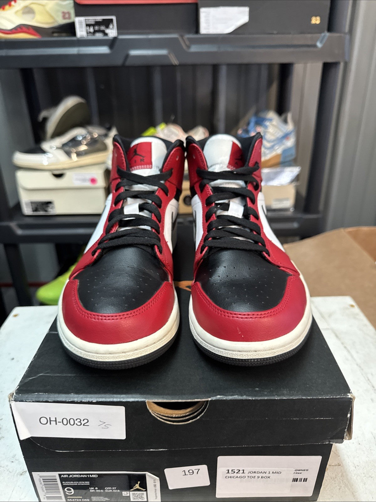 - Red, Black & White Chicago Size 9 MJ - Nike Air Jordan 1 Mid - product image from the listing.