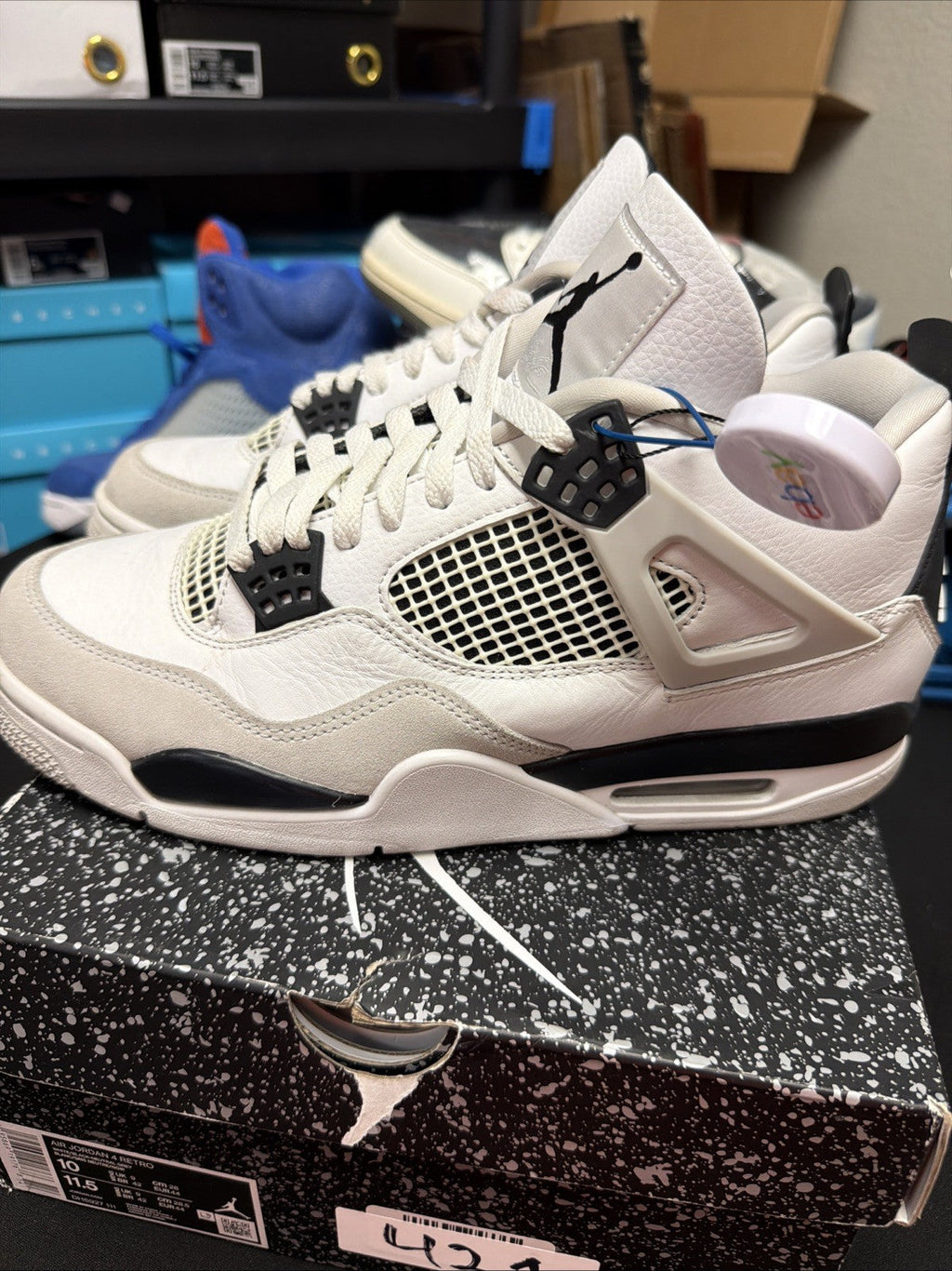Jordan 4 Retro Mid Military Black - Size 10 - product image from the listing.