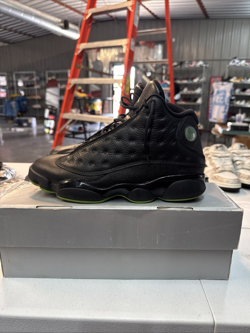 Air Jordan 13 Retro Black Altitude Green - Size 9.5 - product image from the listing.