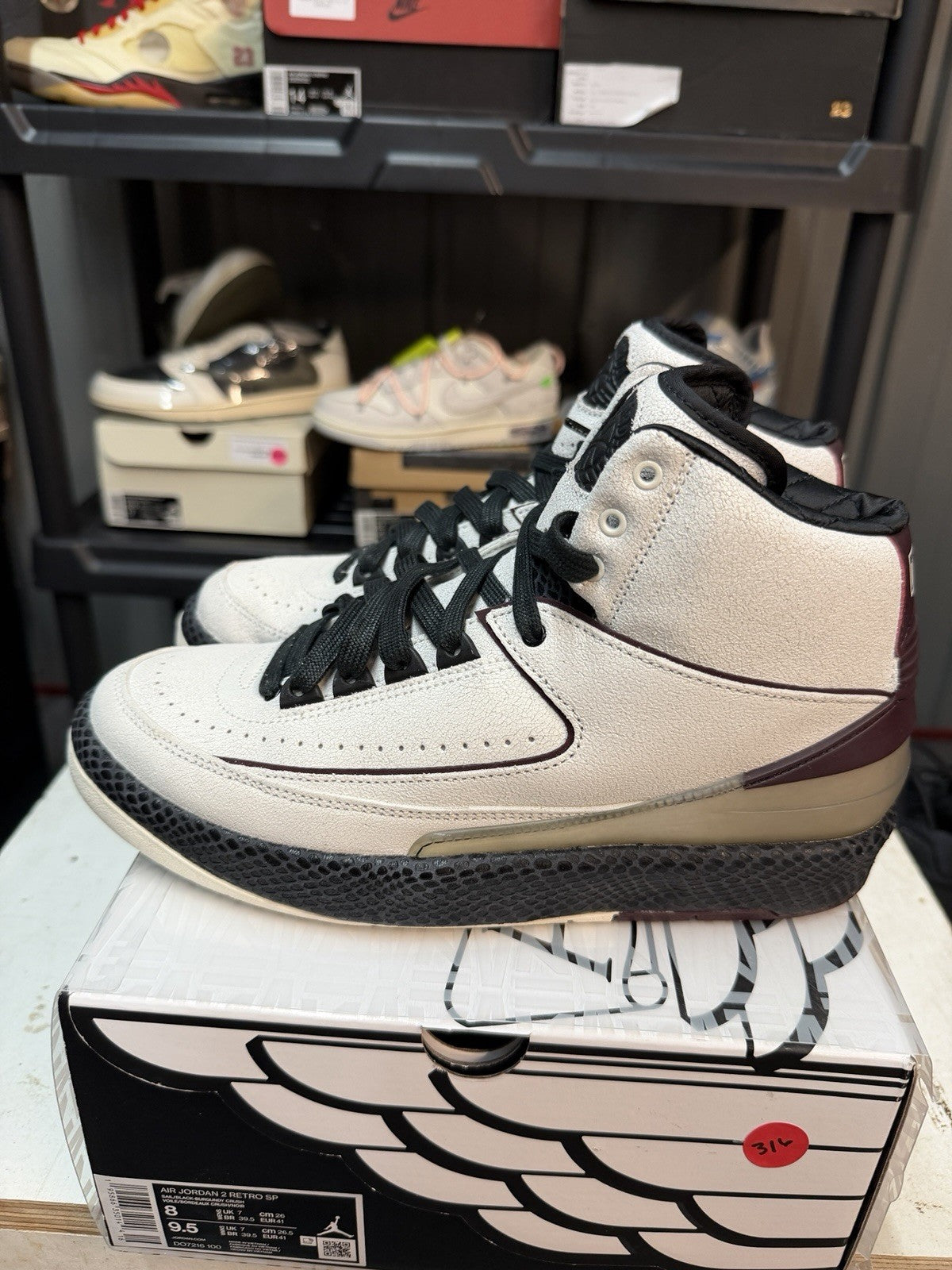 Men's A Ma Maniere Jordan 2 Retro SP Airness 8 DO7216-100 Sail Burgundy - product image from the listing.